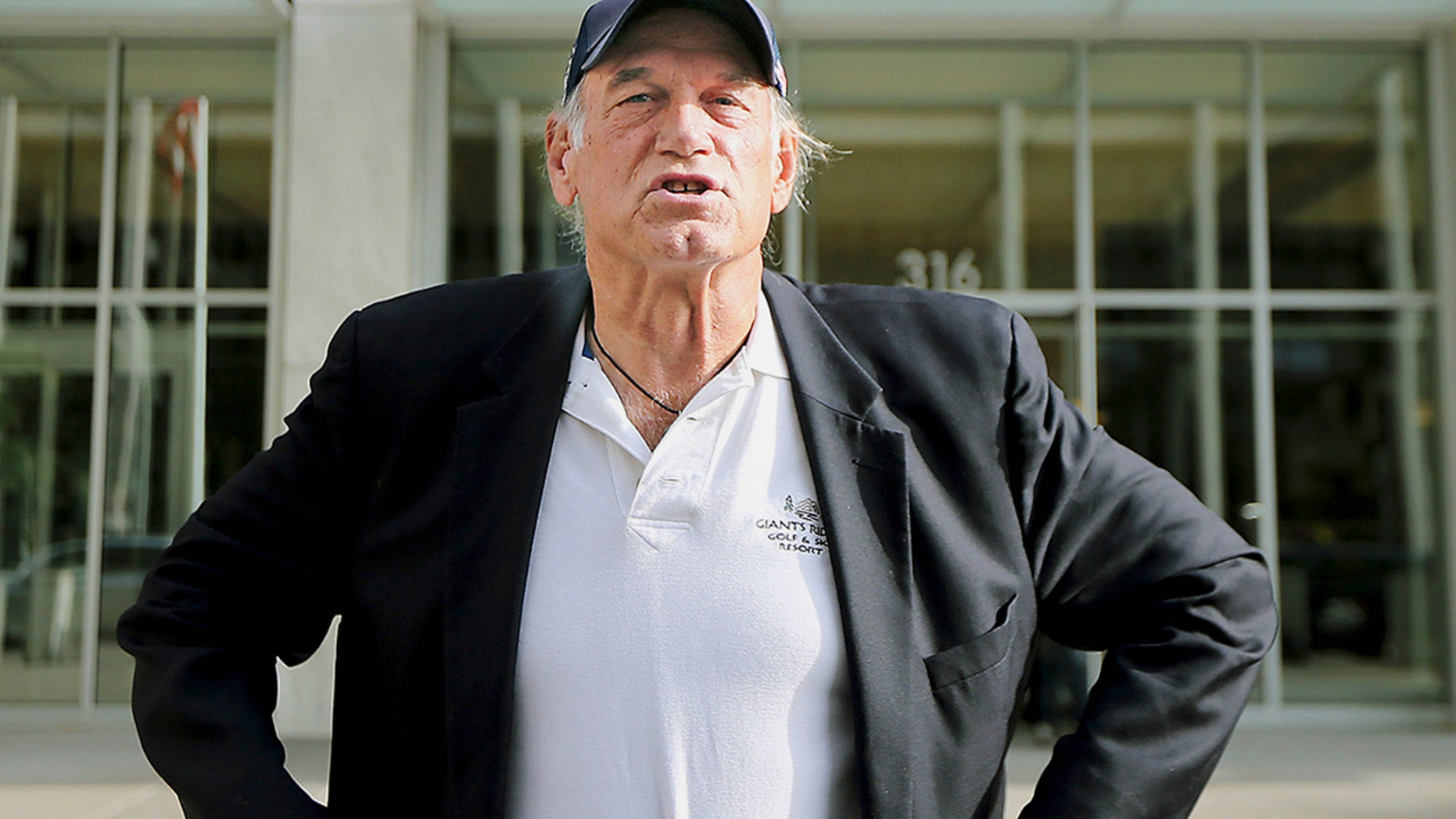 In this Oct. 20, 2015, file photo, former Minnesota governor and professional wrestler Jesse Ventura talks to reporters outside the federal building in St. Paul, Minn.