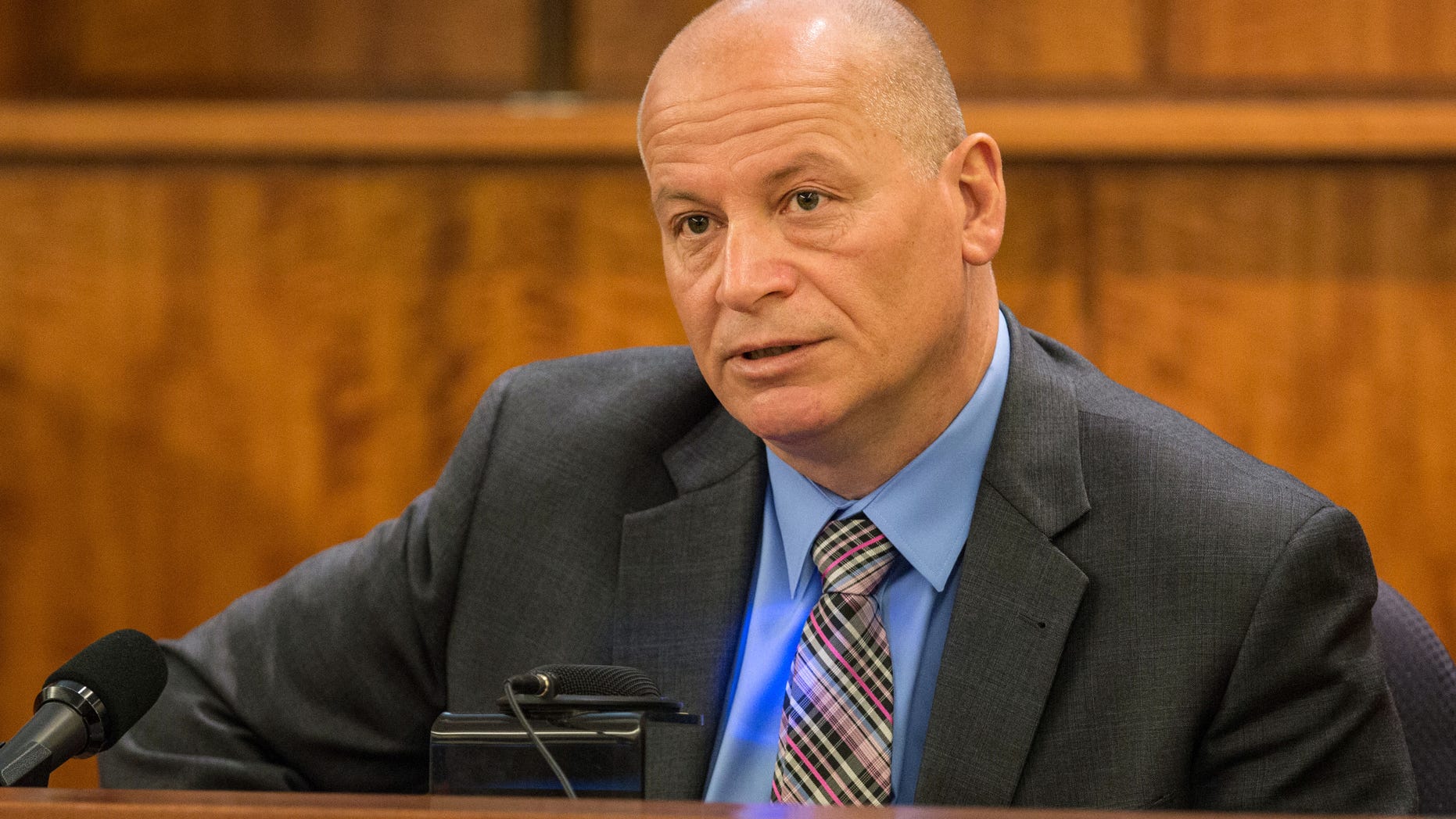 Mark Briggs, New England Patriots' director of security, testifies during former New England Patriots football player Aaron Hernandez's murder trial, Tuesday, March 31, 2015, at Bristol County Superior Court in Fall River, Mass. Hernandez is accused of killing Odin Lloyd in June 2013. (AP Photo/The Boston Globe, Aram Boghosian, Pool)