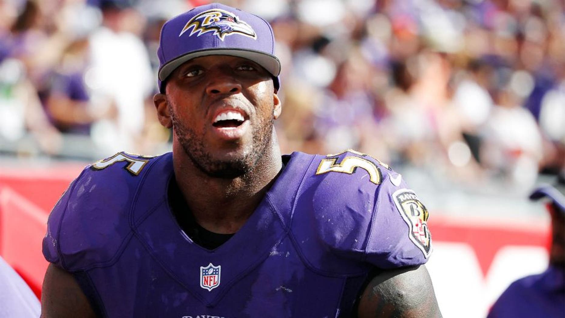 Oct 12, 2014; Tampa, FL, USA; Baltimore Ravens outside linebacker Terrell Suggs (55) against the Tampa Bay Buccaneers during the second half at Raymond James Stadium. Baltimore Ravens defeated the Tampa Bay Buccaneers 48-17. Mandatory Credit: Kim Klement-USA TODAY Sports