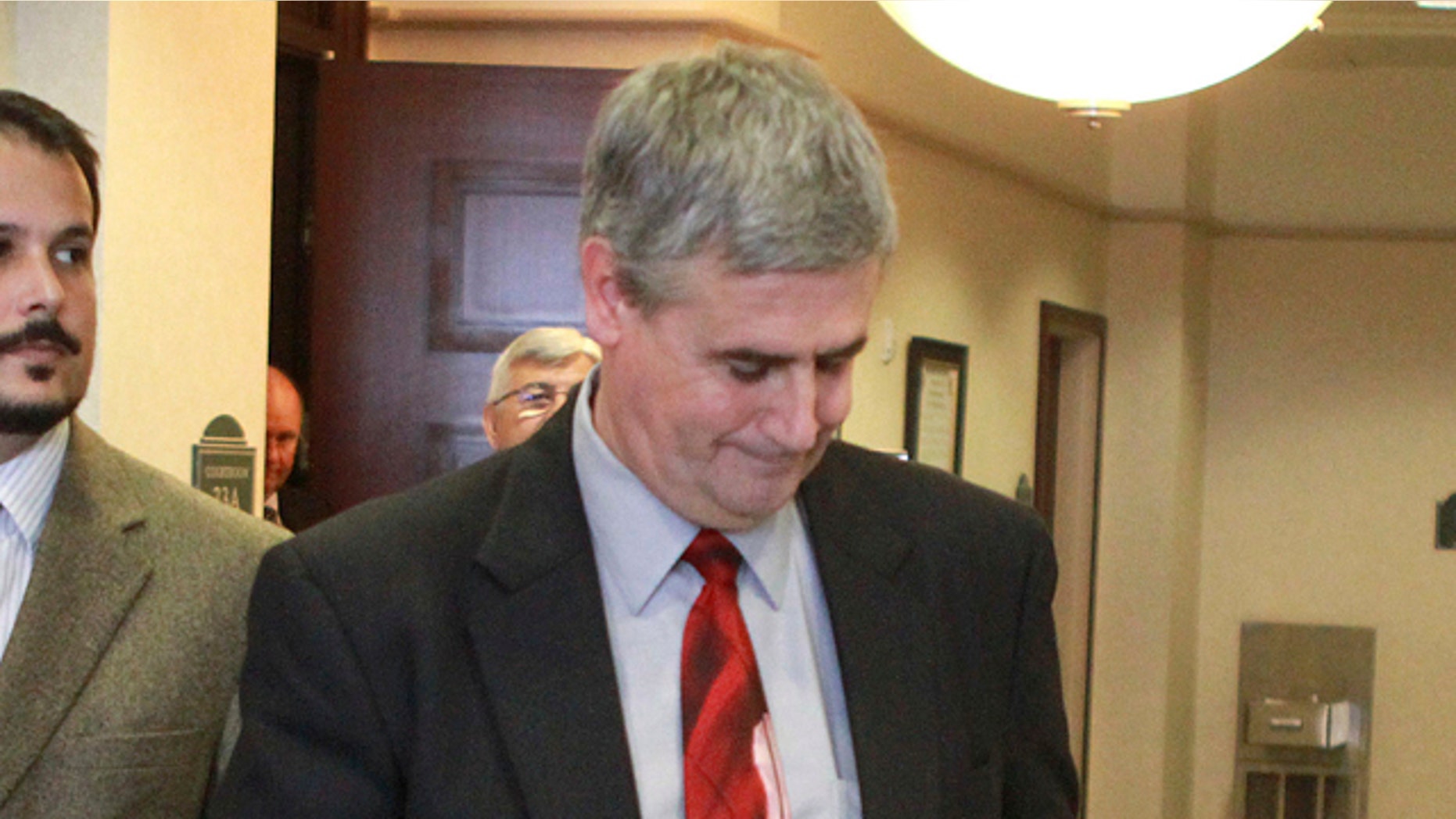 July 5: Prosecutor Jeff Ashton leaves the courtroom after Casey Anthony was found not guilty.