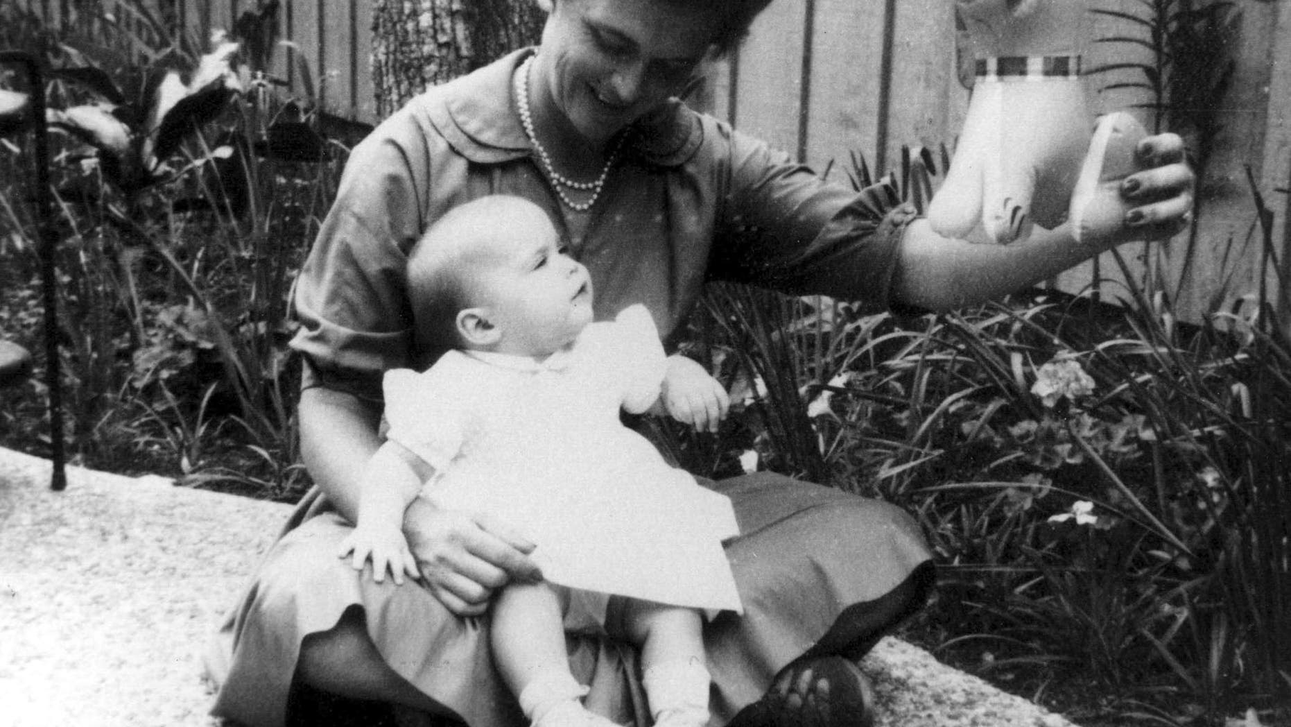 Barbara and her daughter, Doro, Easter, April 1960.
