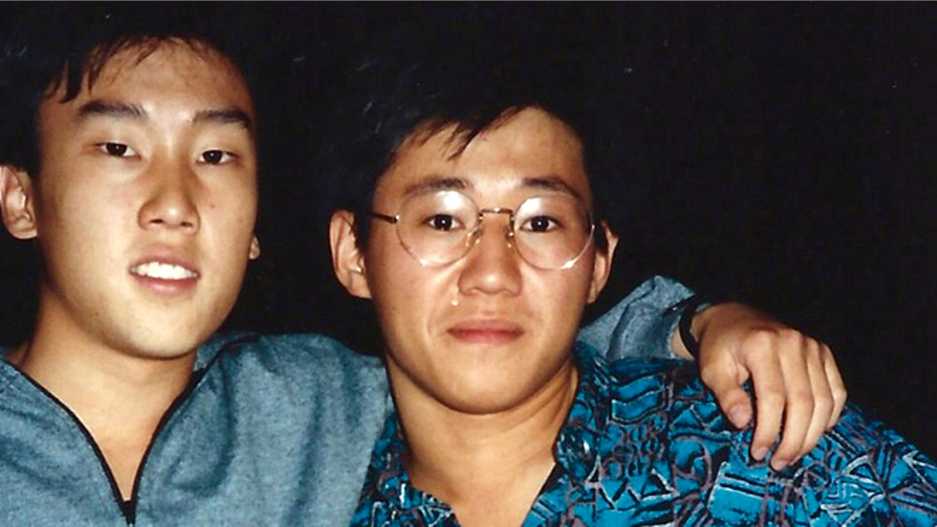 FILE - This 1988 file photo provided by Bobby Lee shows Kenneth Bae, right, and Bobby Lee together when they were freshmen students at the University of Oregon. Bae, detained for nearly six months in North Korea, has been sentenced to 15 years of labor for crimes against the state.