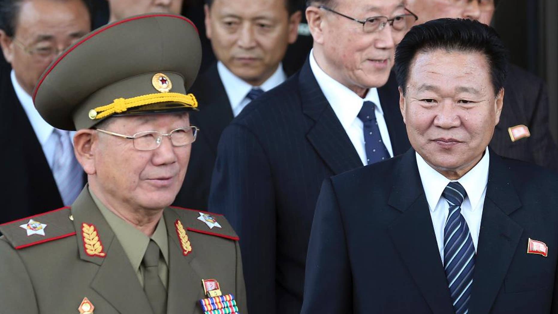 In this Saturday, Oct. 4, 2014 file photo, North Korea’s National Defense Commission Vice Chairman Hwang Pyong So, left, and North Korea’s ruling Workers Party Secretaries, Choe Ryong Hae, right, and Kim Yang Gon, center right, leave after a meeting with South Korean officials at a hotel in Incheon, South Korea. North Korea leader Kim Jong Un will soon send a special envoy to Russia, Pyongyang's state media reported Friday, in a trip expected to focus on how to boost ties at a time when Pyongyang faces deepening diplomat isolation. The North's Korean Central News Agency made the announcement about Choe 's planned trip but it did not give the timing or the exact purpose of the trip. (AP Photo/Yonhap, Yun Tae-hyun, File) KOREA OUT