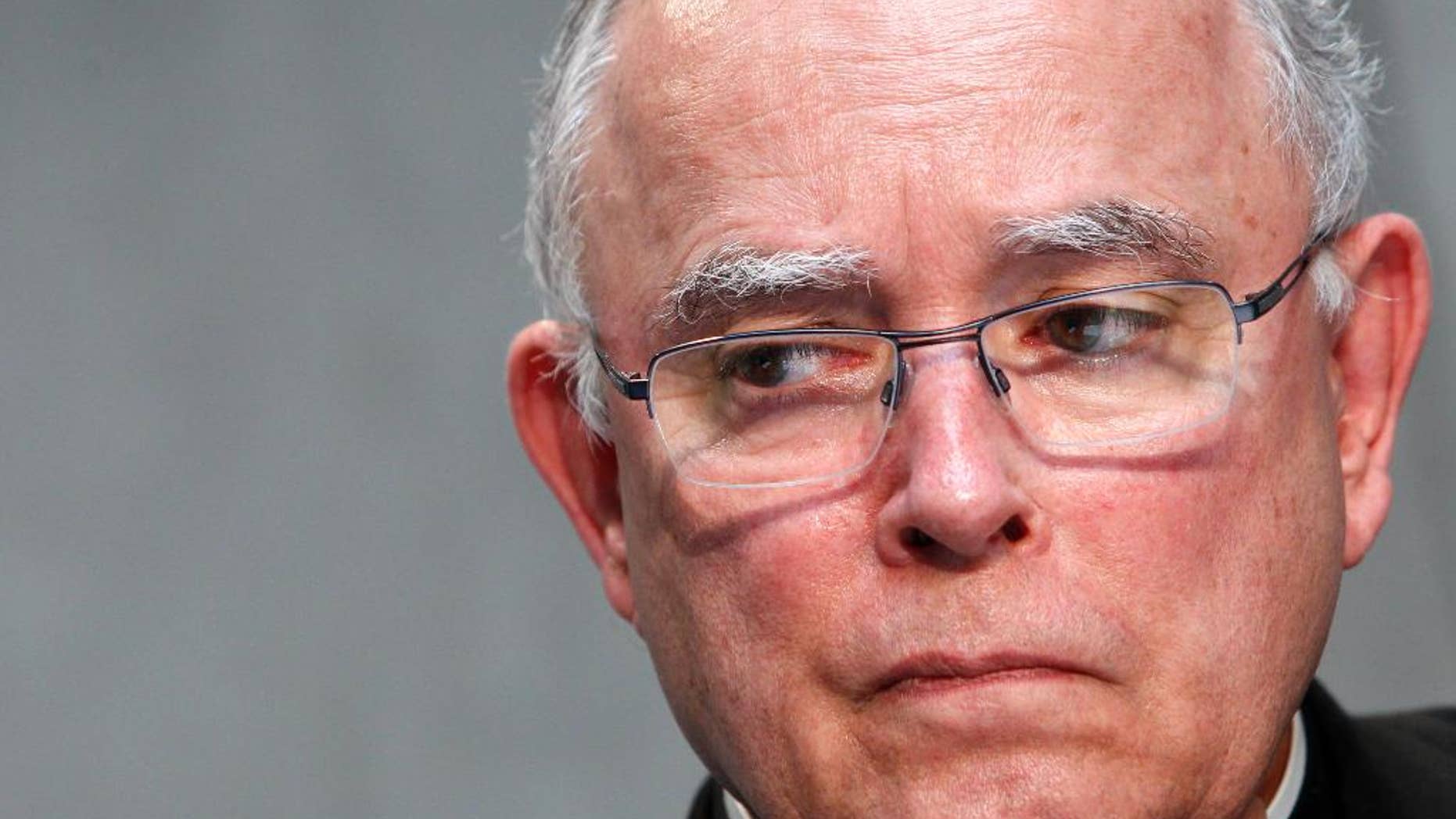 FILE - In this June 25, 2015, file photo, Philadelphia's Archbishop Charles Joseph Chaput attends a news conference at the Vatican. The leader of the Roman Catholic Archdiocese of Philadelphia said divorced and remarried parishioners should abstain from sex and live "like brother and sister" if they want to receive Holy Communion and haven't had their previous marriage annulled. Chaput issued a new set of pastoral guidelines for clergy and other leaders in the archdiocese that went into effect July 1, 2016. (AP Photo/Riccardo De Luca, File)