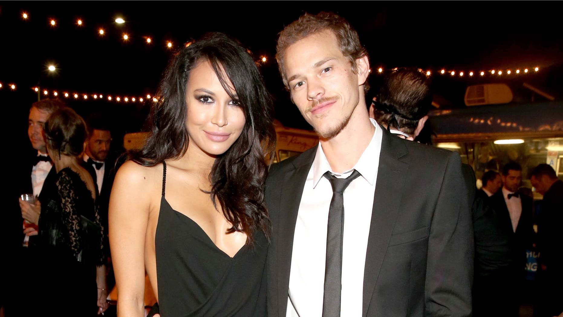 Actors Naya Rivera (L) and Ryan Dorsey at The UNICEF Dia de los Muertos Black & White Masquerade Ball at Hollywood Forever Cemetery benefiting UNICEF's education programs for Syrian children on October 30, 2014 in Los Angeles, California.