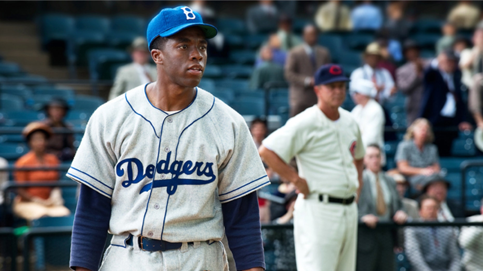 This film image released by Warner Bros. Pictures shows Chadwick Boseman as Jackie Robinson in a scene from "42."