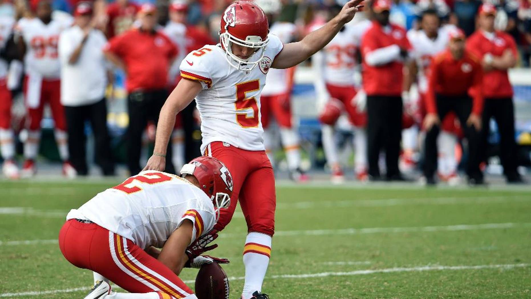 Kansas City Chiefs kicker Cairo Santos kicks the game-winning field goal against the San Diego Chargers during the second half of an NFL football game Sunday, Oct. 19, 2014, in San Diego. (AP Photo/Denis Poroy)