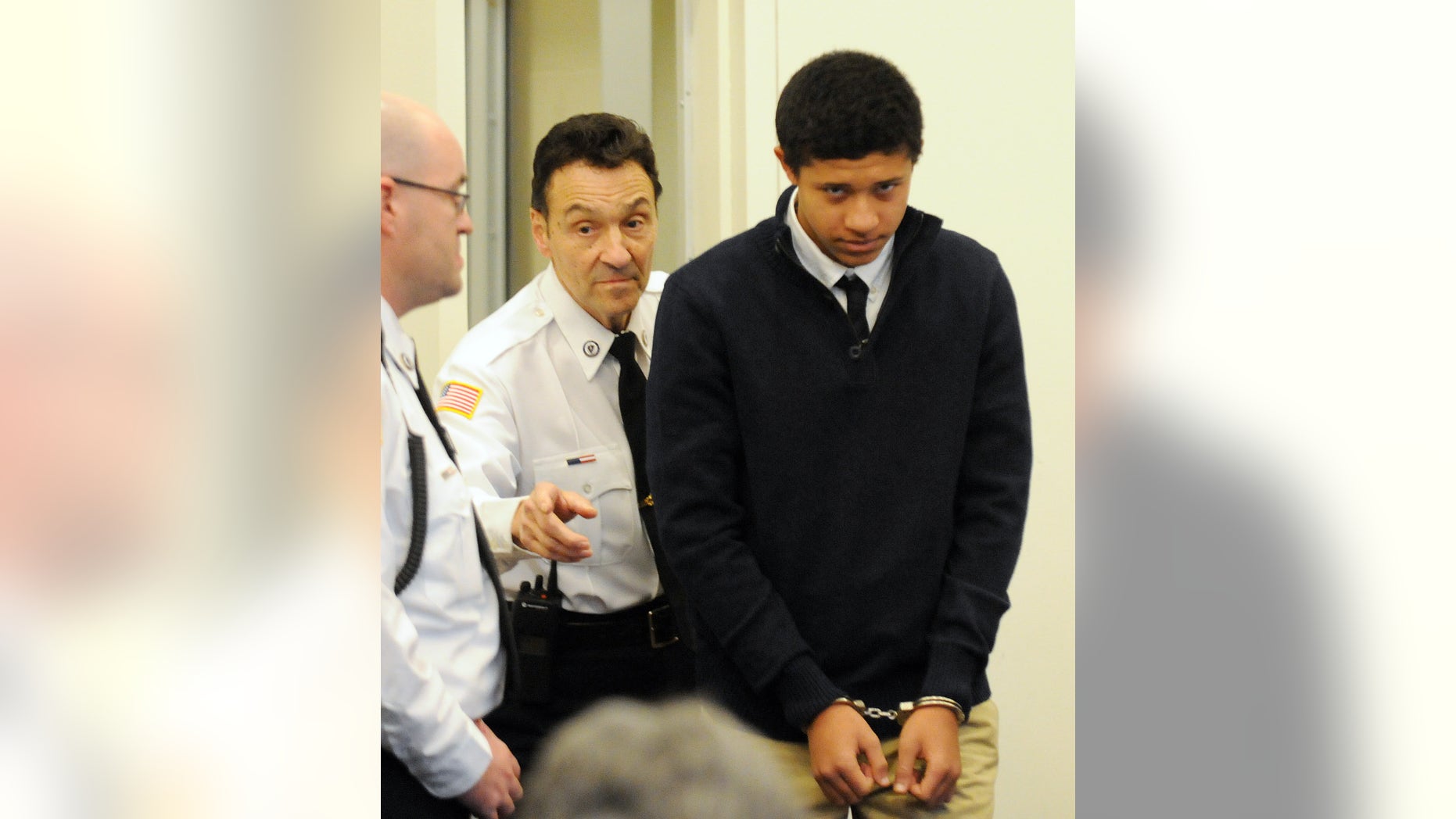 FILE - In this Dec. 4, 2013 file photo, Phillip Chism, 14, from Danvers, Mass., is lead into the court room at his arraignment in Salem Superior Court in Salem, Mass. Chism, accused of raping and killing Danvers High School teacher Colleen Ritzer in October, is returning to court Thursday, Jan. 30, 2014 for arraignment on a second rape charge. (AP Photo/The Eagle-Tribune, Paul Bilodeau, Pool, File)
