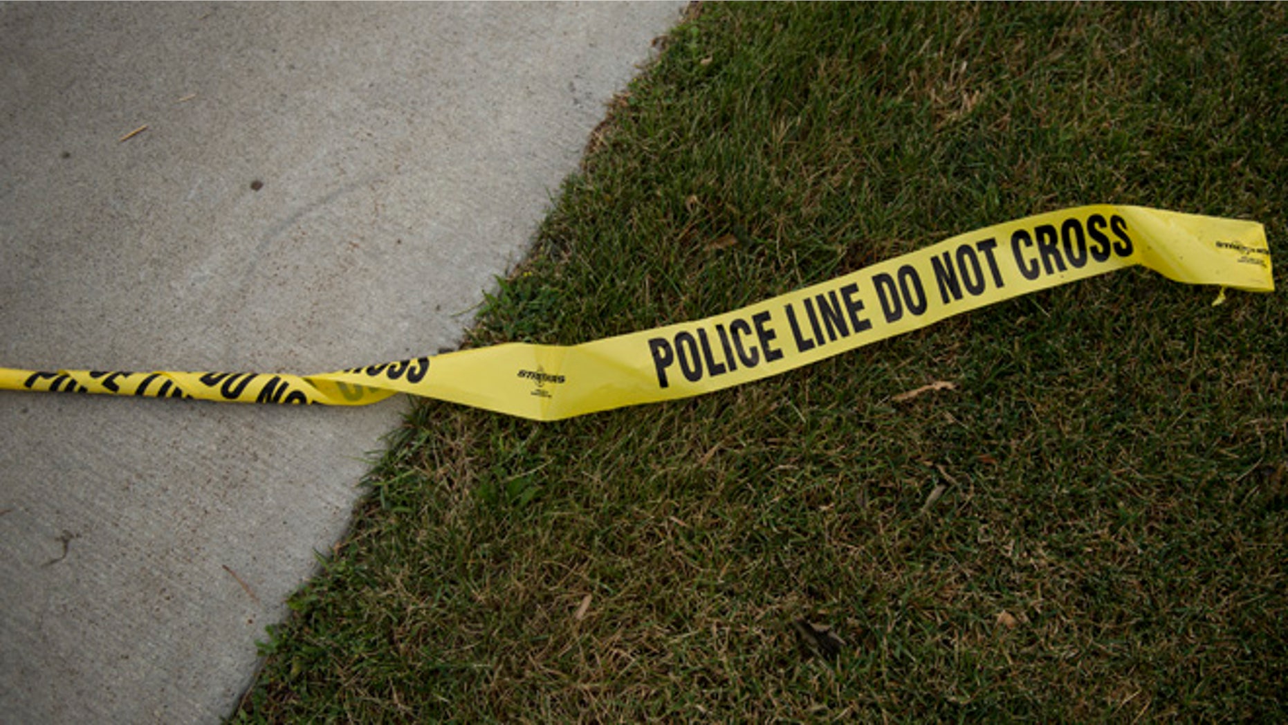 FALCON HEIGHTS, MN - JULY 07: Police tape left Larpenteur Avenue following the police shooting death of a black man on July 7, 2016 in St. Paul, Minnesota. Philando Castile was shot and killed last night, July 6, 2016, by a police officer in Falcon Heights, MN. (Photo by Stephen Maturen/Getty Images)