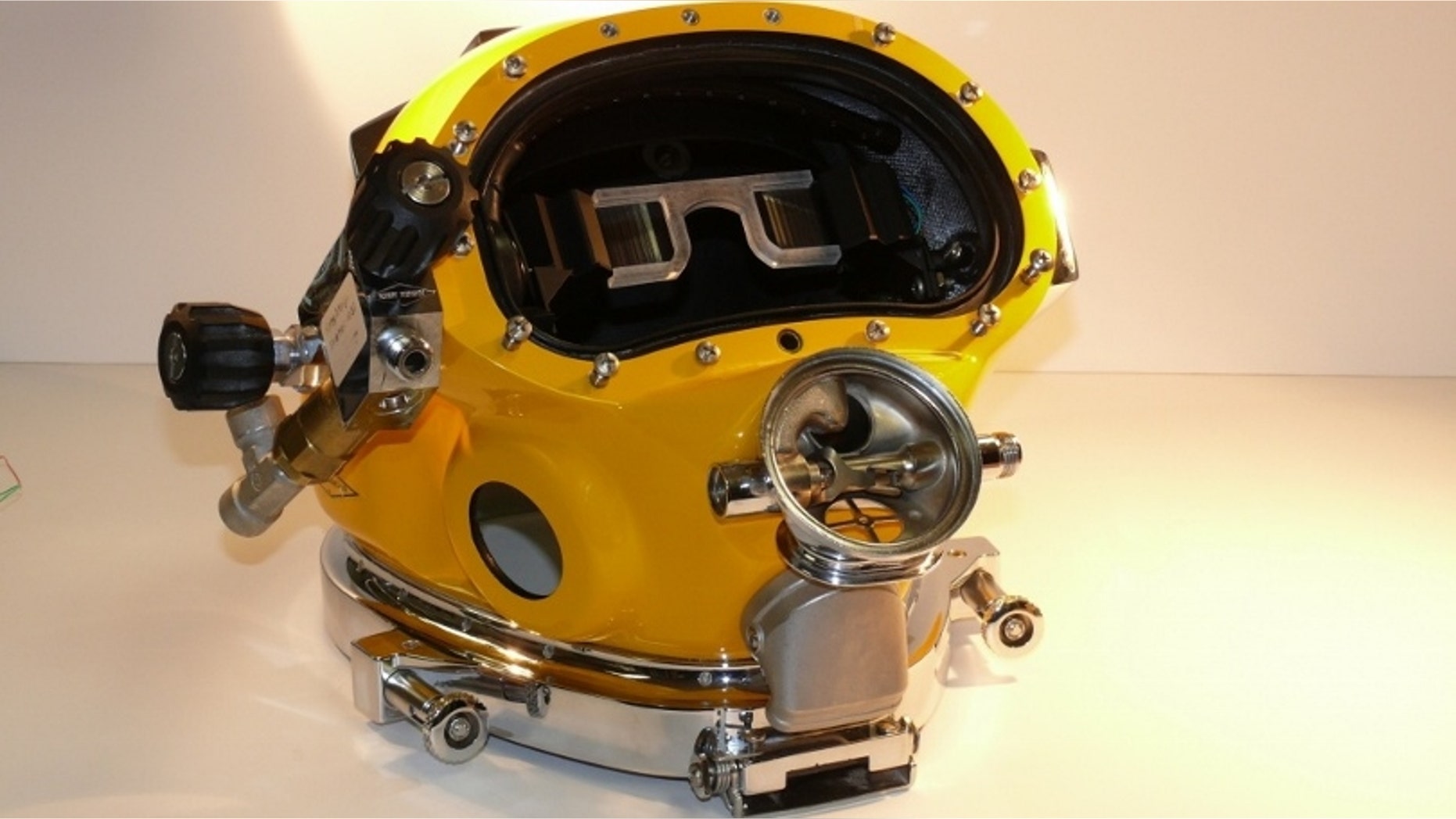 Prototype of the Divers Augmented Vision Display (DVAD) positioned within a dive helmet.
