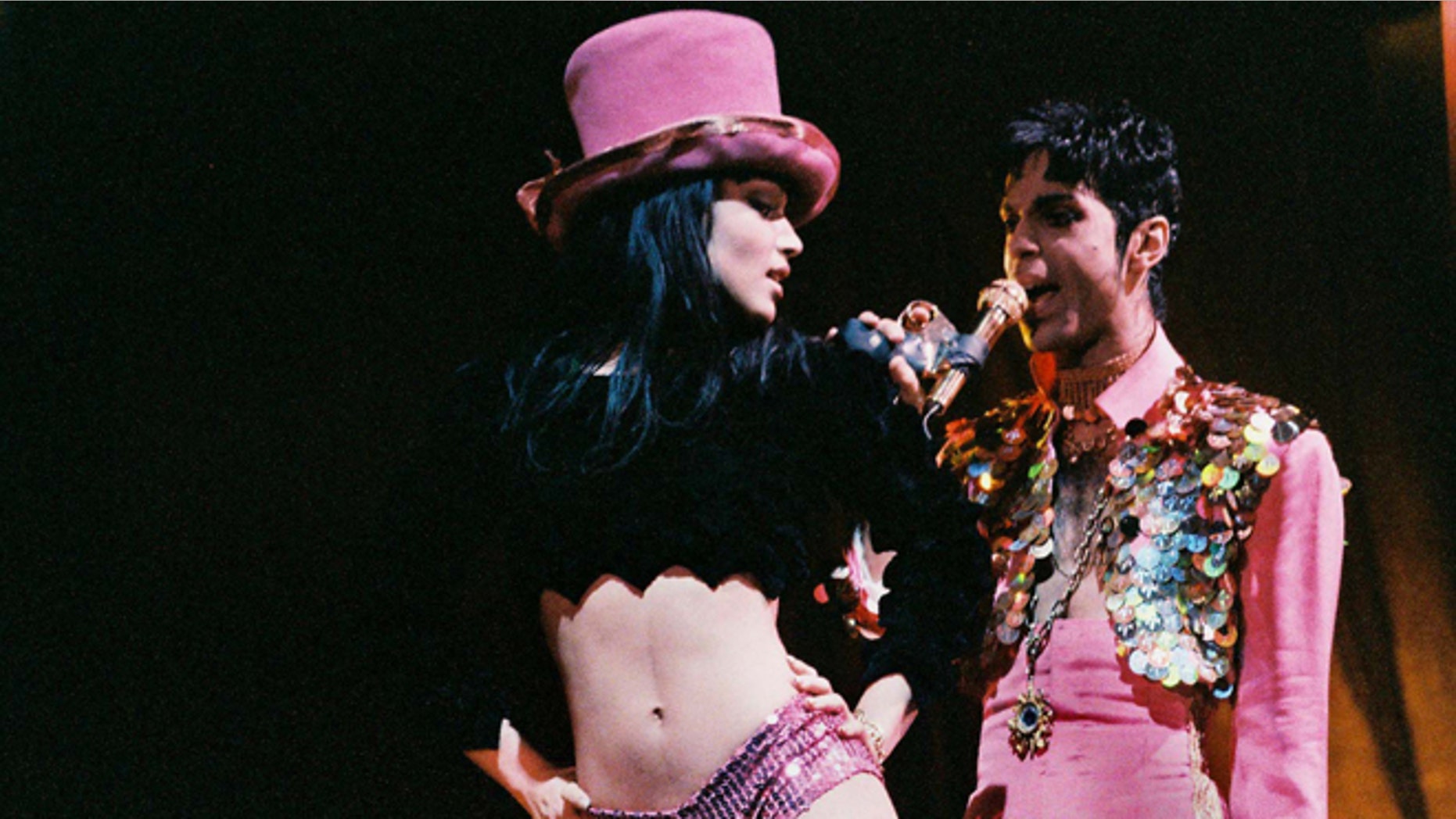 LONDON, UNITED KINGDOM - MARCH 4: Mayte Garcia and Prince perform on stage on 'The Ultimate Live Experience' tour at Wembley Arena on March 4th, 1995 in London, United Kingdom. (Photo by Peter Still/Redferns)