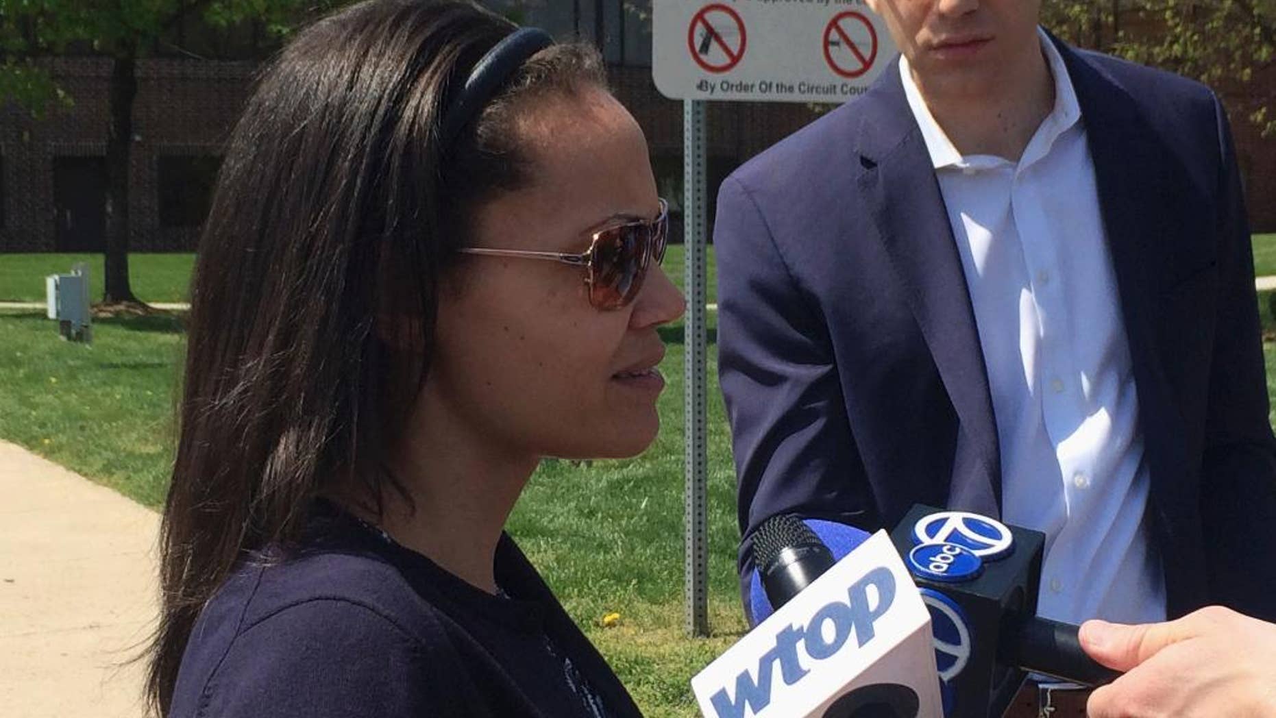 Hera McLeod talks to reporters in Manassas, Va., Thursday, April 13, 2017, after her ex-fiancé, Joaquin Shadow Rams, was convicted of murdering their 1-year-old son. A judge has convicted a Virginia father of murdering his 1-year-old son in an effort to collect on more than $500,000 in life insurance he had taken out on the boy. (AP Photo/Matthew Barakat)