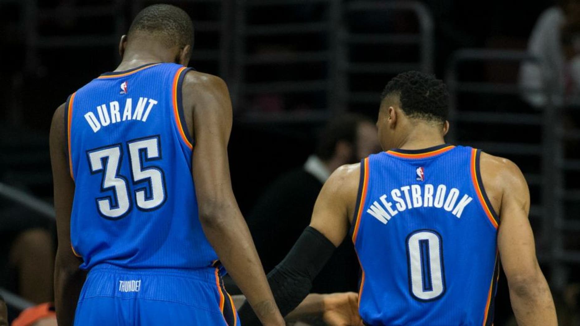 SAN ANTONIO, TX - MAY 10: Russell Westbrook #0 of the Oklahoma City Thunder high fives Kevin Durant #35 during the game against the San Antonio Spurs in Game Five of the Western Conference Semifinals during the 2016 NBA Playoffs on May 10, 2016 at the AT&T Center in San Antonio, Texas. NOTE TO USER: User expressly acknowledges and agrees that, by downloading and or using this photograph, user is consenting to the terms and conditions of the Getty Images License Agreement. Mandatory Copyright Notice: Copyright 2016 NBAE (Photos by Layne Murdoch/NBAE via Getty Images)