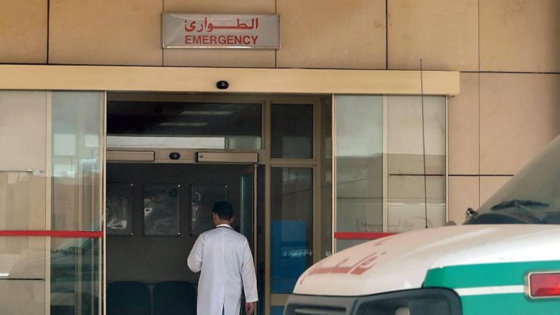A medical workers enters the emergency section of a local hospital in the centre of the Saudi capital Riyadh, on May 13, 2013