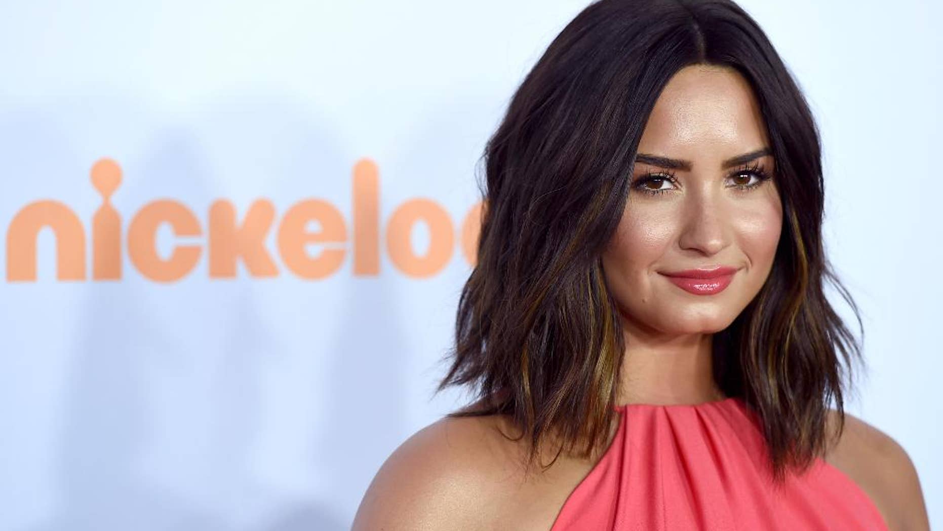 FILE - In this March 11, 2017, file photo, Demi Lovato arrives at the Kids' Choice Awards at the Galen Center in Los Angeles. Lovato celebrated five years of sobriety on March 15, 2017,
with an Instagram post. (Photo by Jordan Strauss/Invision/AP, File)