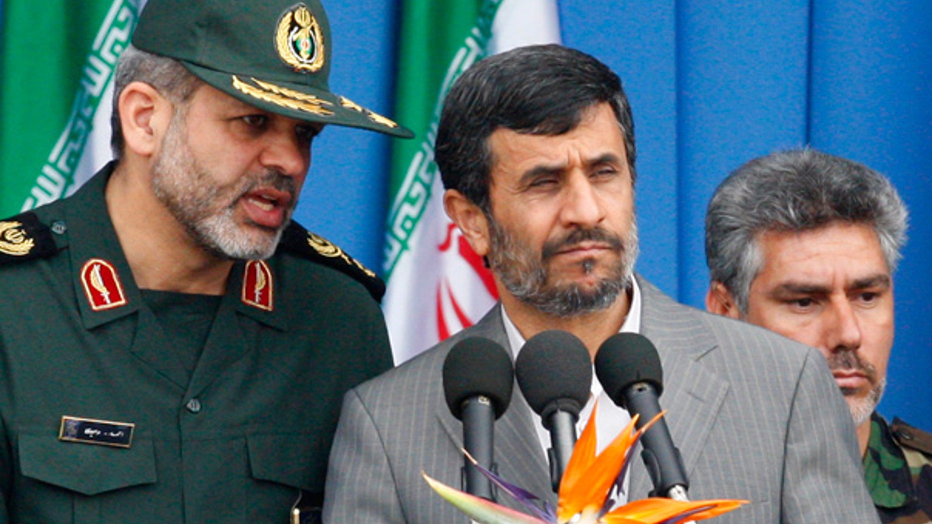April 18: Iranian President Mahmoud Ahmadinejad listens to his Defense Minister, Gen. Ahmad Vahidi during an army parade in Tehran.