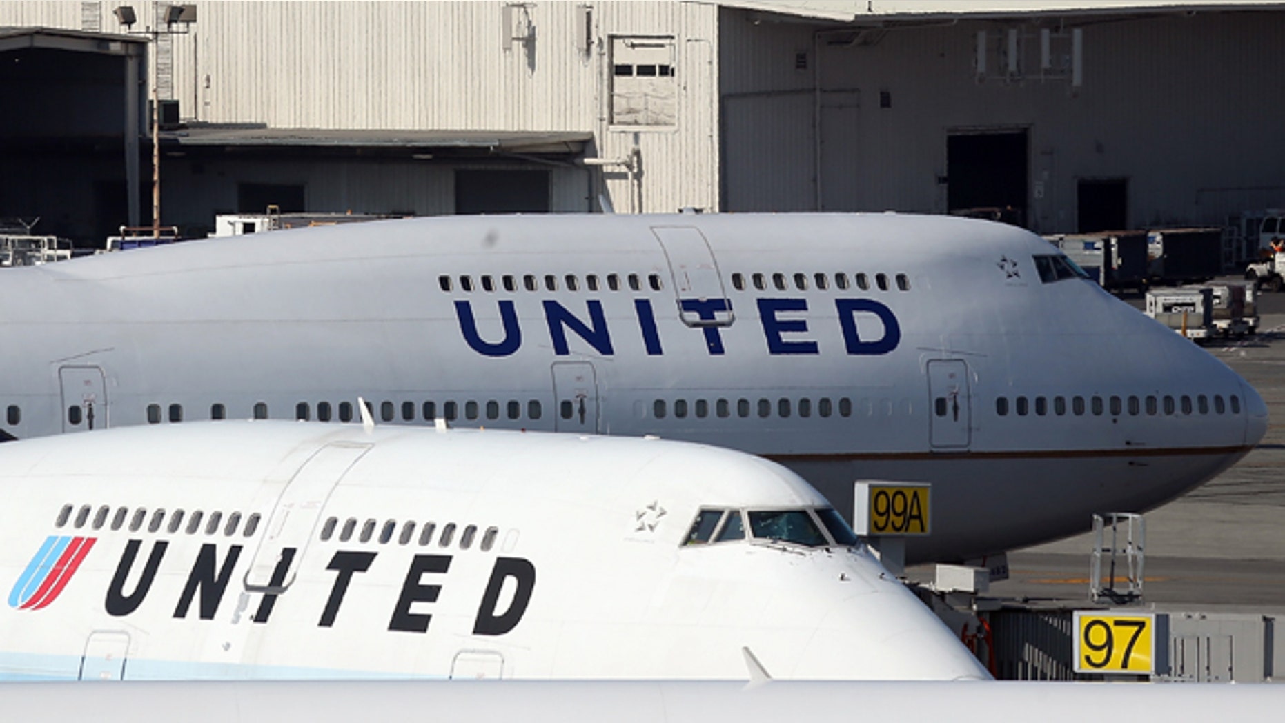 SAN FRANCISCO, CA - JANUARY 23: United Airlines planes sit on the tarmac at San Francisco International Airport on January 23, 2014 in San Francisco, California. United Airlines parent company United Continental Holdings reported a surge in fourth quarter profits with earnings of $140 million compared to a loss of $620 million one year ago. (Photo by Justin Sullivan/Getty Images)