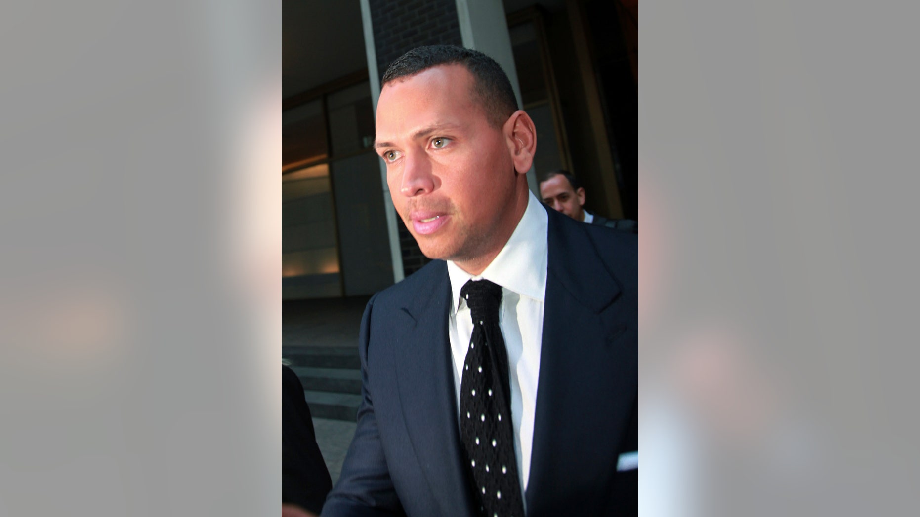 FILE- In this Sept. 30, 2013 file photo, Alex Rodriguez leaves the offices of Major League Baseball in New York. Rodriguez has accepted his season-long suspension from Major League Baseball, the longest penalty in the sport's history related to performance-enhancing drugs. Rodriguez withdrew his lawsuits against Major League Baseball, Commissioner Bud Selig and the players' association to overturn his season-long suspension on Friday, Feb. 7, 2014. The notices of dismissal were filed in federal court in Manhattan. (AP Photo/David Karp, File)