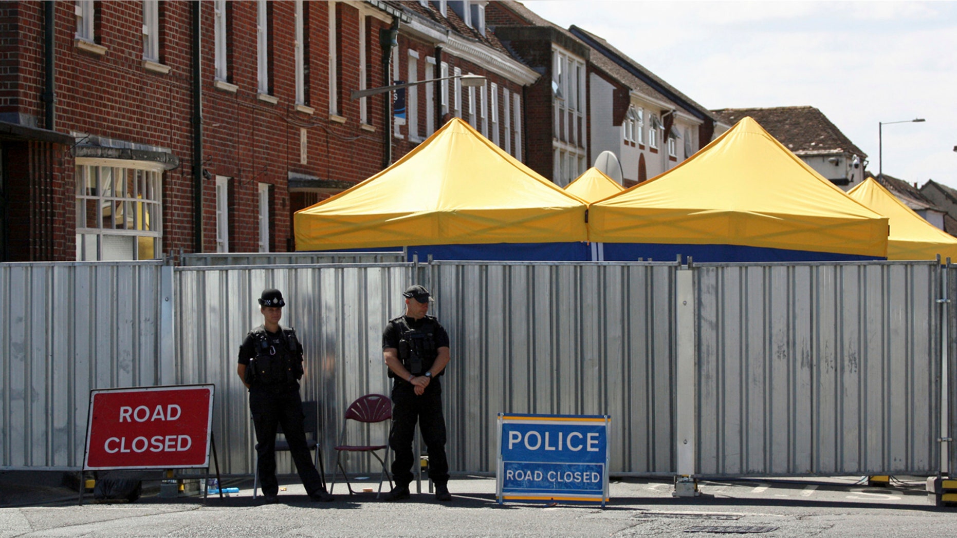 Police officers on duty in Salisbury, England, as the investigation into the death of Dawn Sturgess, who died after being exposed to nerve agent novichok, continues, Tuesday July 10, 2018.