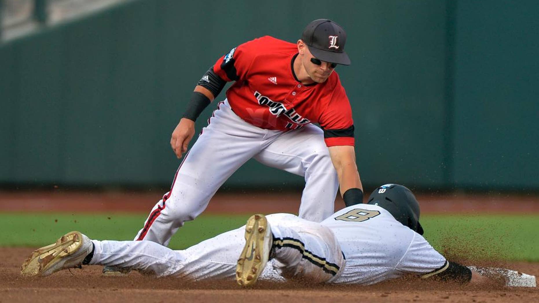 Vanderbilt's Rhett Wiseman (8) is caught stealing second base by Louisville second baseman Zach Lucas, top, in the second inning of an NCAA baseball College World Series game in Omaha, Neb., Saturday, June 14, 2014. (AP Photo/Ted Kirk)