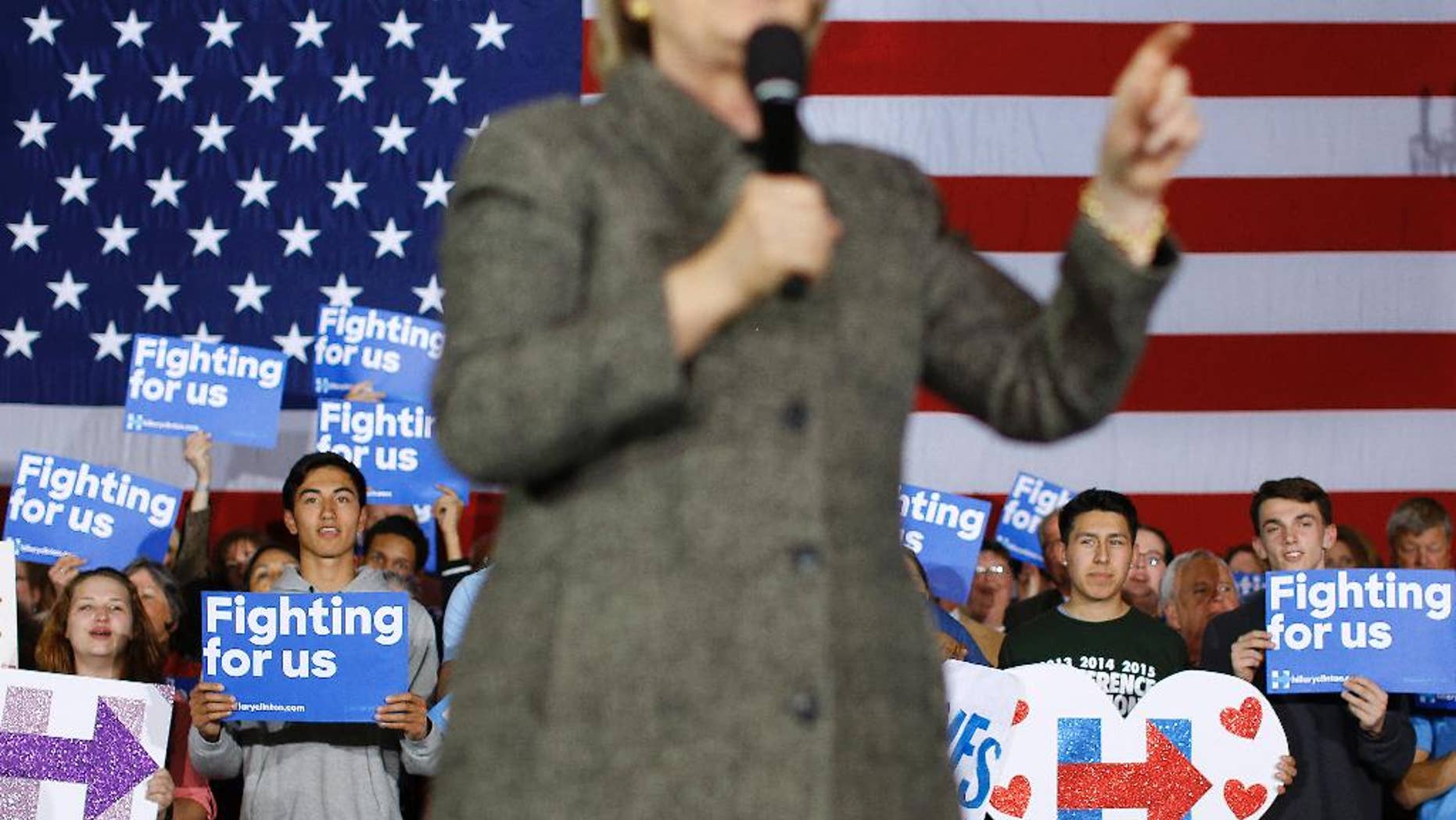 Attendees listen as Democratic presidential candidate Hillary Clinton speaks at a rally at the Riverside Ballroom in Green Bay, Wis., Tuesday, March 29, 2016. (AP Photo/Patrick Semansky)
