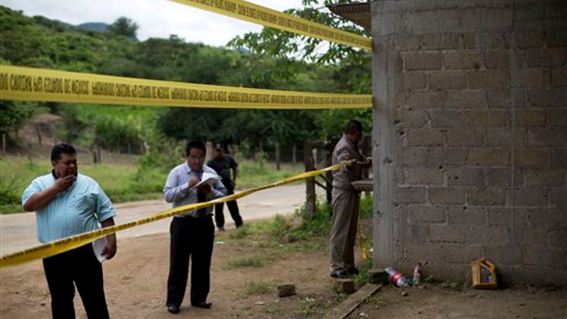 State authorities seal off site of a shootout between Mexican soldiers and alleged criminals on July 3, 2014.