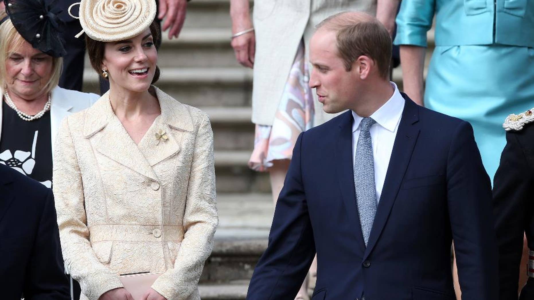 Britain's Prince William and Kate, Duchess of Cambridge attend the Secretary of State for Northern Ireland Theresa Villiers' garden party at the royal residence at Hillsborough Castle, Northern Ireland, Tuesday June 14, 2016. (Brian Lawless/PA via AP) UNITED KINGDOM OUT