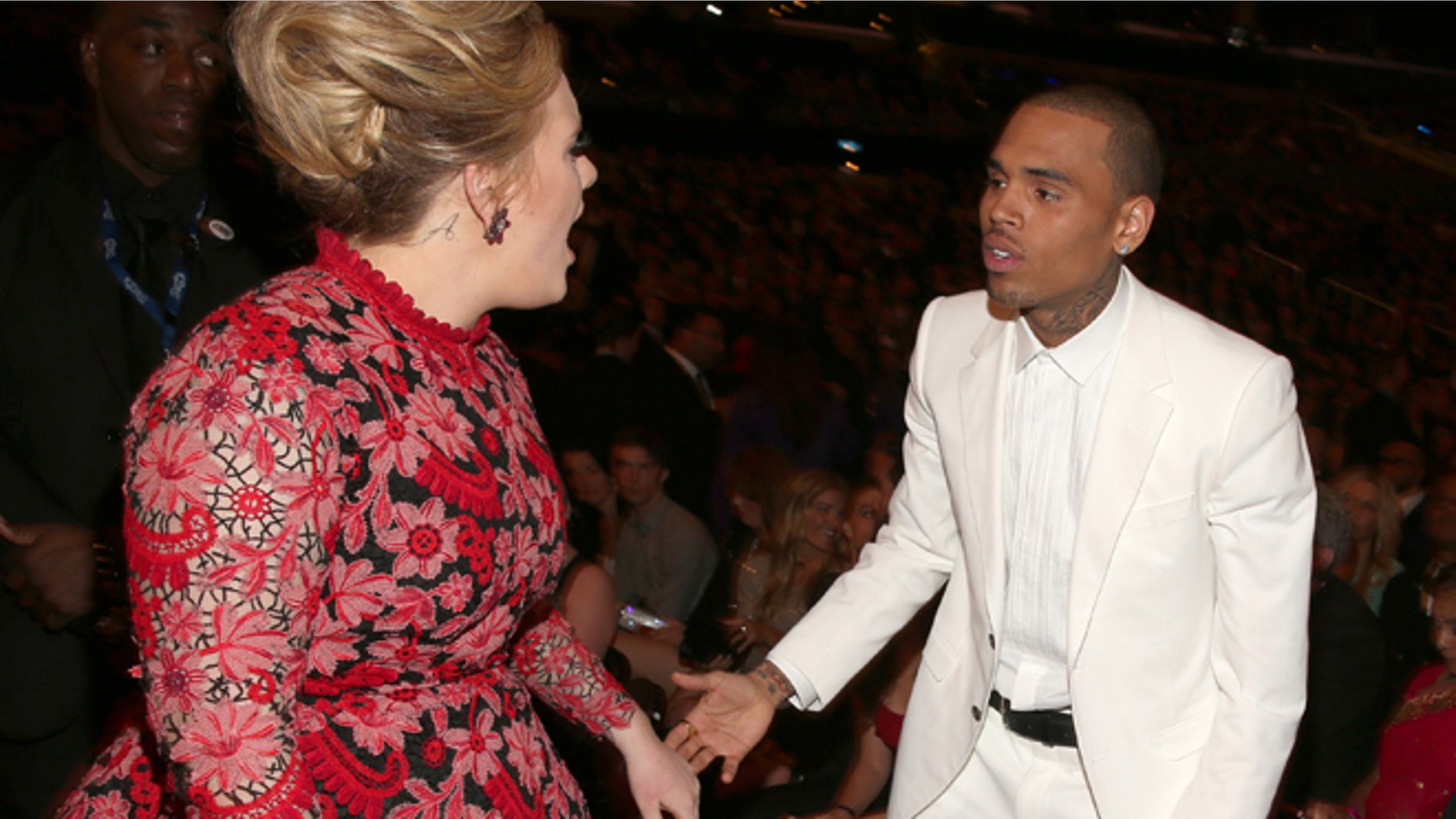 Singer Adele and singer Chris Brown attend the 55th Annual GRAMMY Awards at Staples Center on February 10, 2013 in Los Angeles, California. (Photo by Christopher Polk/Getty Images for NARAS)