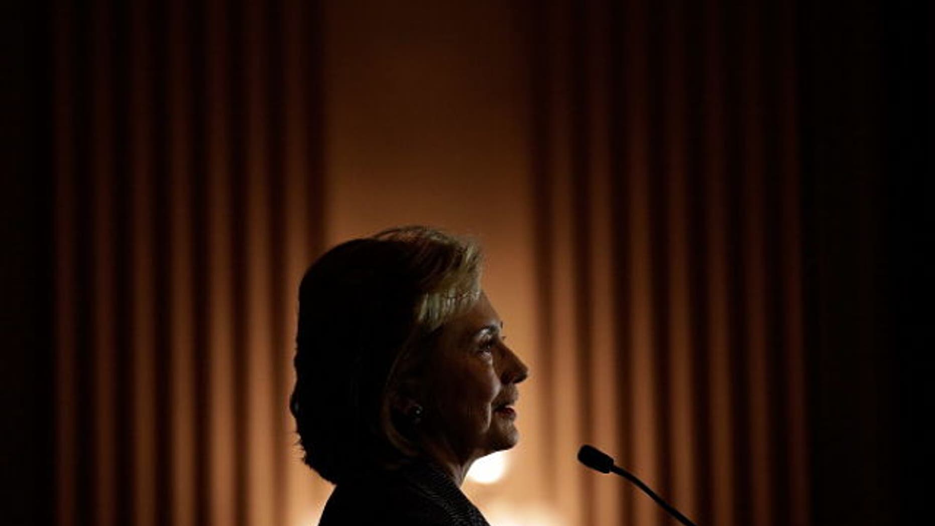 Former Secretary of State Hillary Clinton delivers remarks after being presented the 2013 Tom Lantos Human Rights Prize Dec. 6, 2013 in Washington, D.C. (Photo by Win McNamee/Getty Images)