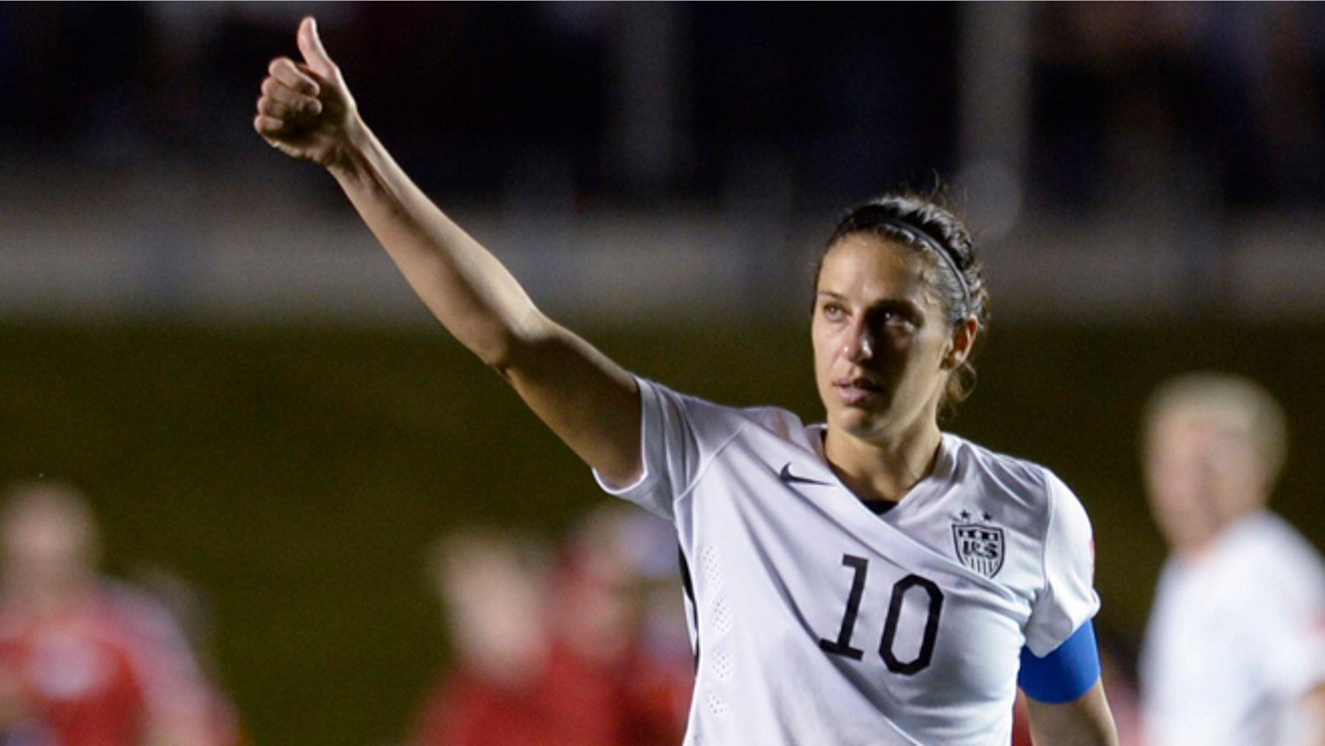 United States' Carli Lloyd (10) looks toward fans after the United States defeatedChina 1-0 in a quarterfinal match in the FIFA Women's World Cup soccer tournament, Friday, June 26, 2015, in Ottawa, Ontario, Canada. (Adrian WyldThe Canadian Press via AP)