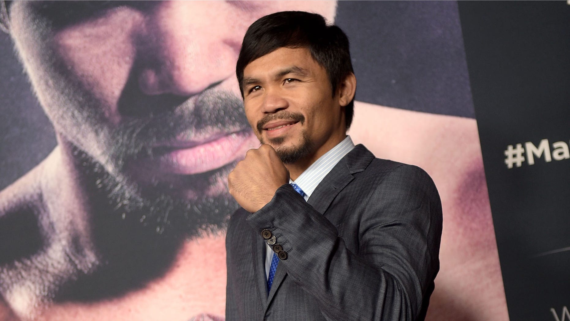 HOLLYWOOD, CA - JANUARY 20: Professional boxer Manny Pacquiao attends the premiere of "Manny" at TCL Chinese Theatre on January 20, 2015 in Hollywood, California. (Photo by Jason Kempin/Getty Images)
