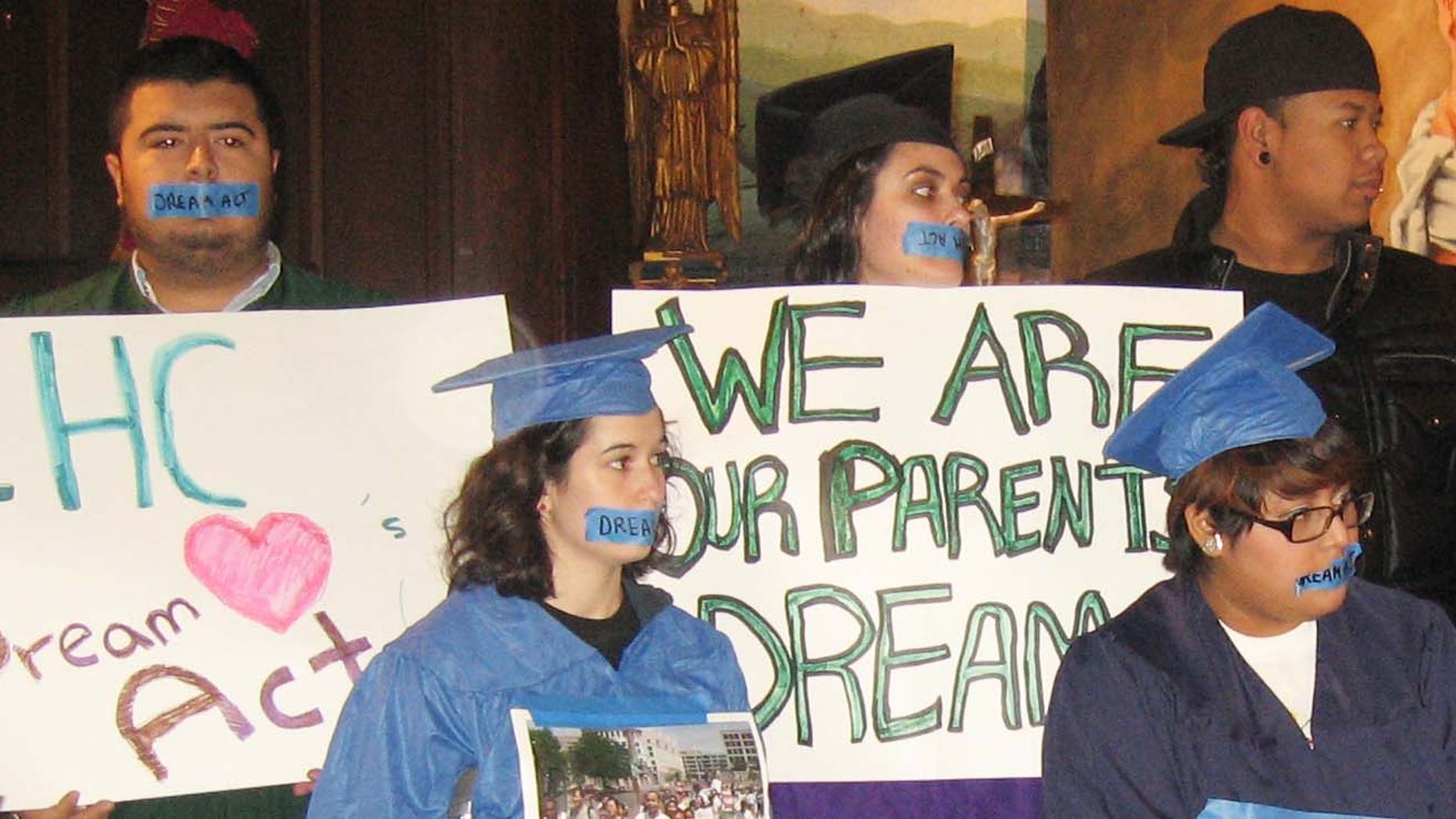Undocumented students push for the DREAM Act at a New York rally.