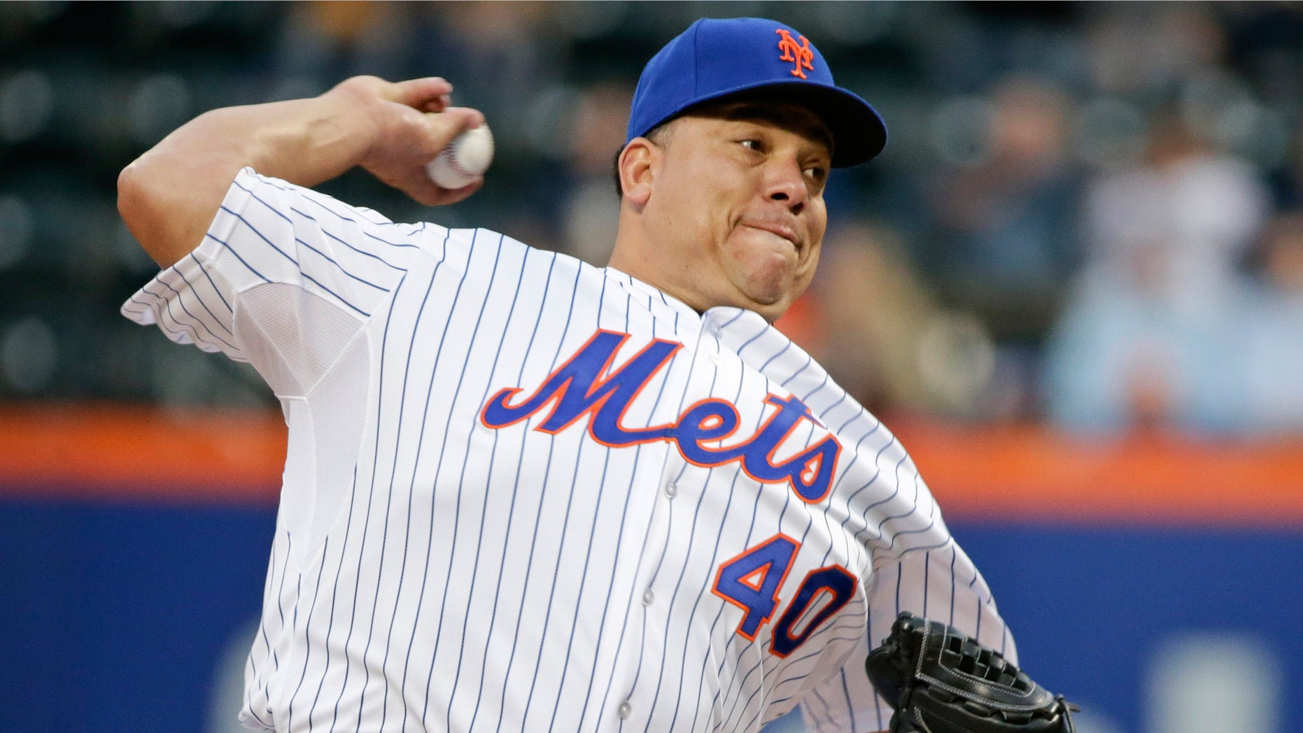FILE - In this May 15, 2015, file photo, New York Mets' Bartolo Colon delivers a pitch during the first inning of a baseball game against the Milwaukee Brewers in New York. Colon remains one of the most effective pitchers in the major leagues, baffling hitters with one pitch _his fastball_ and an uncanny control reminiscent of his Cy Young year. (AP Photo/Frank Franklin II, File)