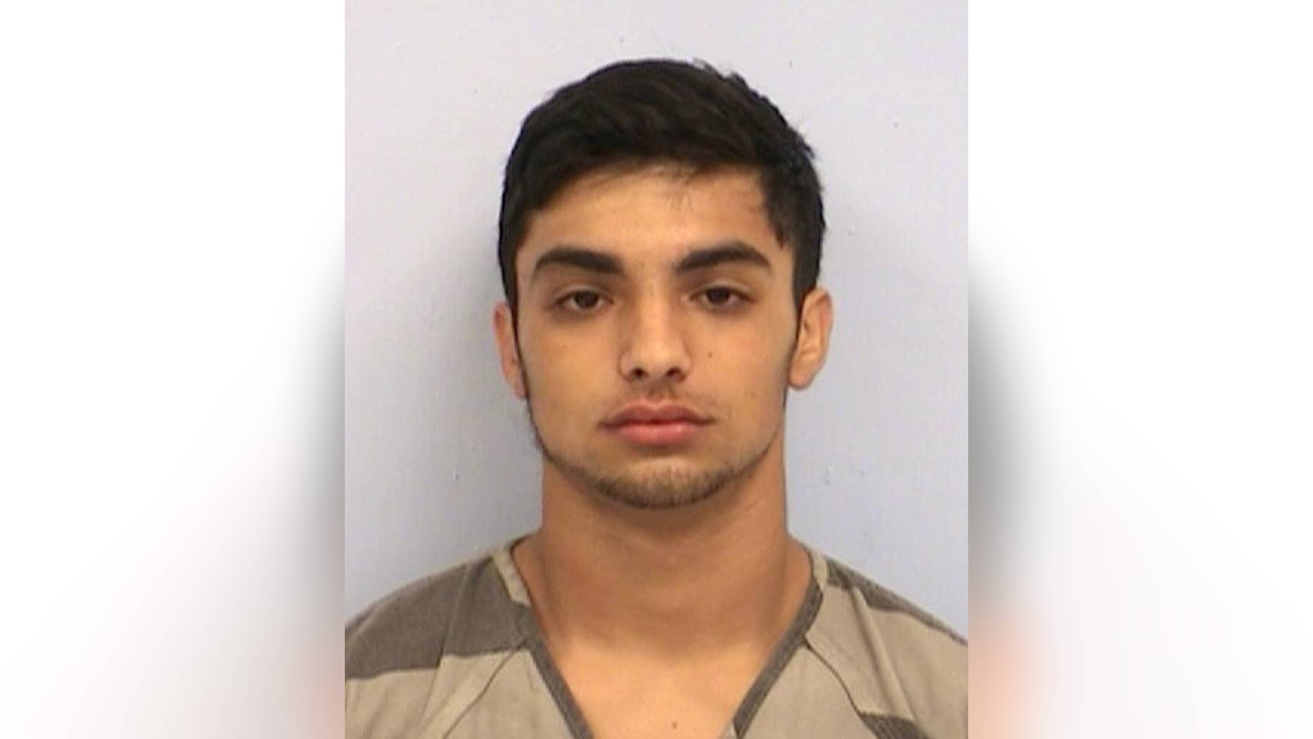 This undated photo provided by the Austin Police Department shows Zacharay Khabir Anam. Khabir Anam, a Texas man who managed to pull a handgun from his waistband and shoot himself in the head while handcuffed in the back of a police patrol car died of his wound Monday, Jan. 9, 2017 in Austin, Texas, one day after the shooting. An Austin police statement confirmed that 19-year-old Zachary Khabir Anam, died at University Medical Center-Brackenridge in Austin. (Austin Police Department via AP)
