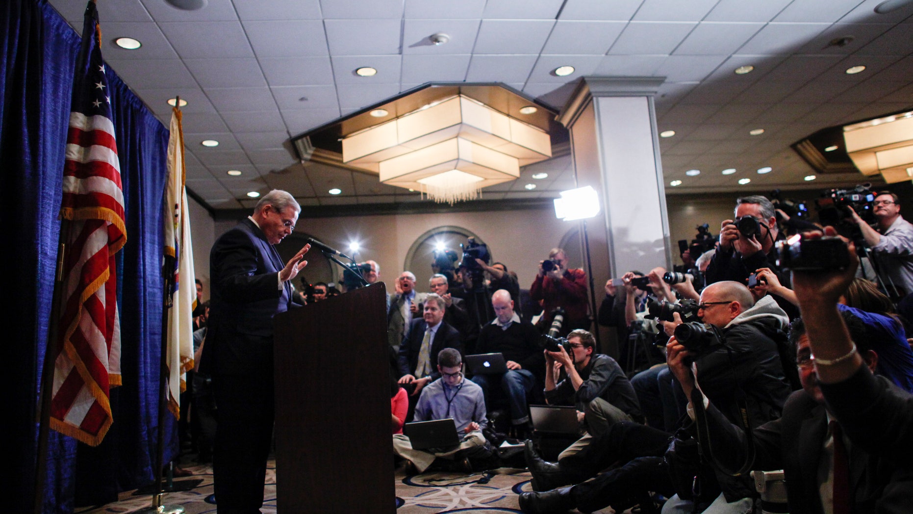 Sen. Menendez arrives to speak at a press conference on April 1, 2015 in Newark, New Jersey.