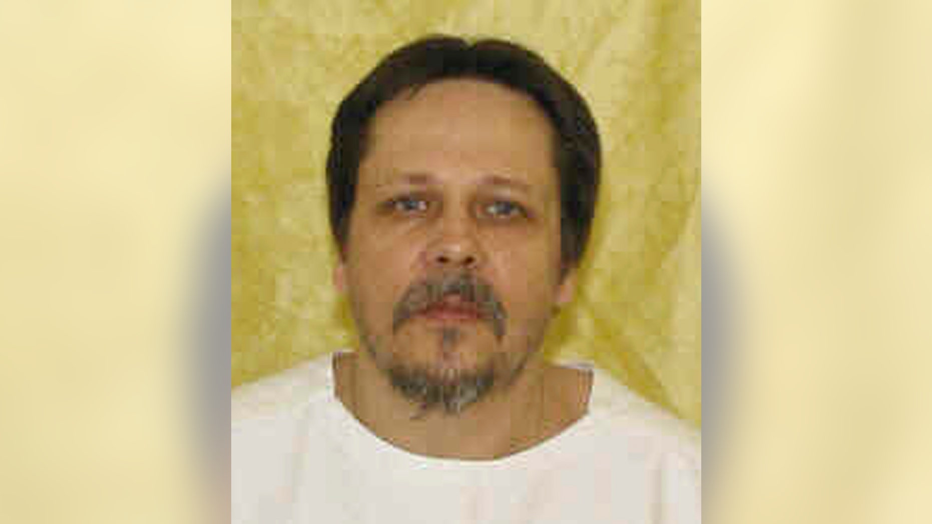 This undated file photo provided by the Ohio Department of Rehabilitation and Correction shows Dennis McGuire.