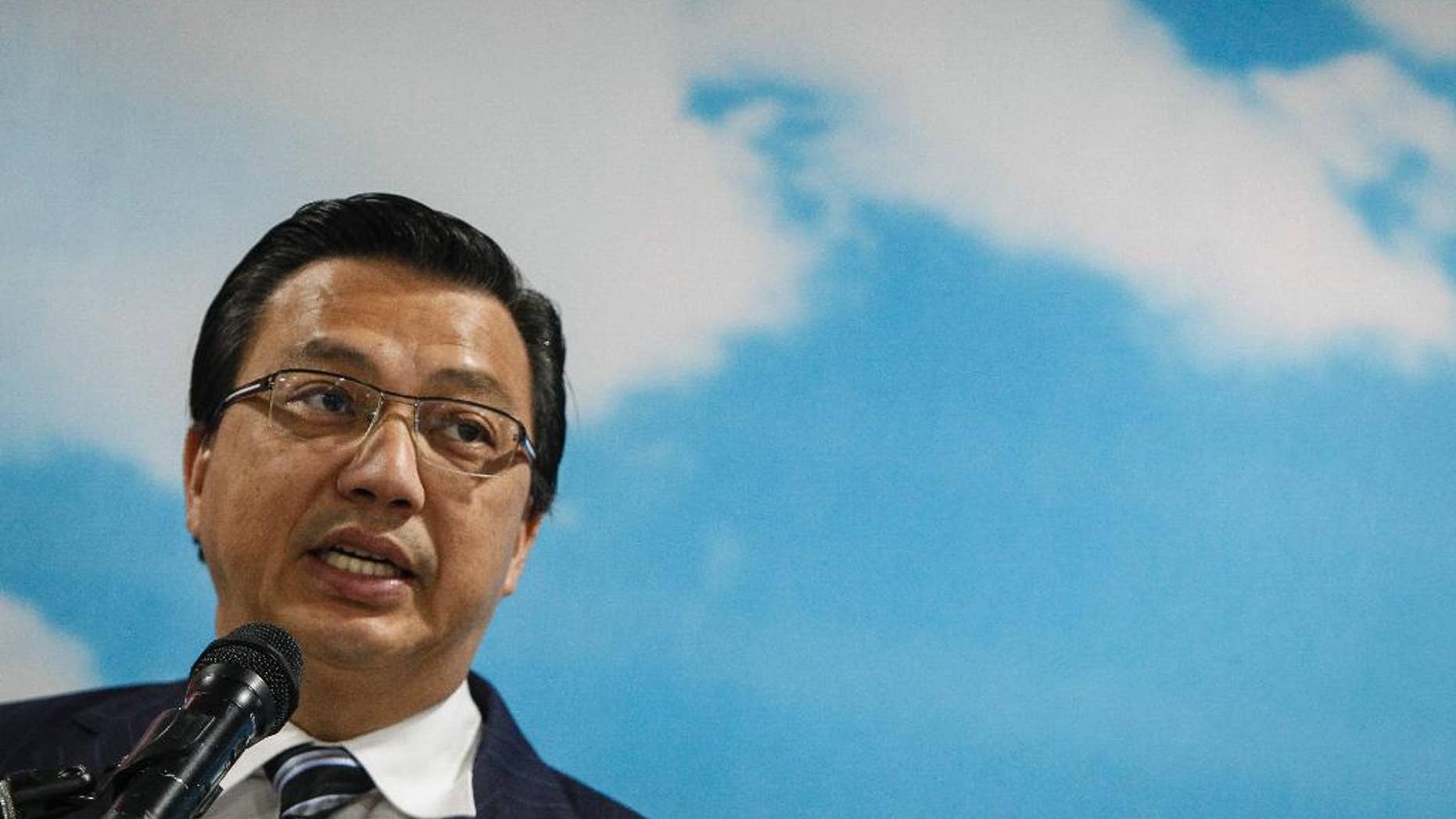 Malaysian Transport Minister Liow Tiong Lai speaks at an event in Shah Alam, Malaysia Wednesday, Aug. 12, 2015. Malaysian officials said Wednesday they are considering to bring back the debris if confirmed to be from Malaysia Airlines Flight 370. Last week, Malaysia said a wing fragment found on the Indian Ocean island of Reunion was confirmed to be from the plane that went missing March 8, 2014, with 239 people aboard while flying from Kuala Lumpur to Beijing. (AP Photo/Joshua Paul)