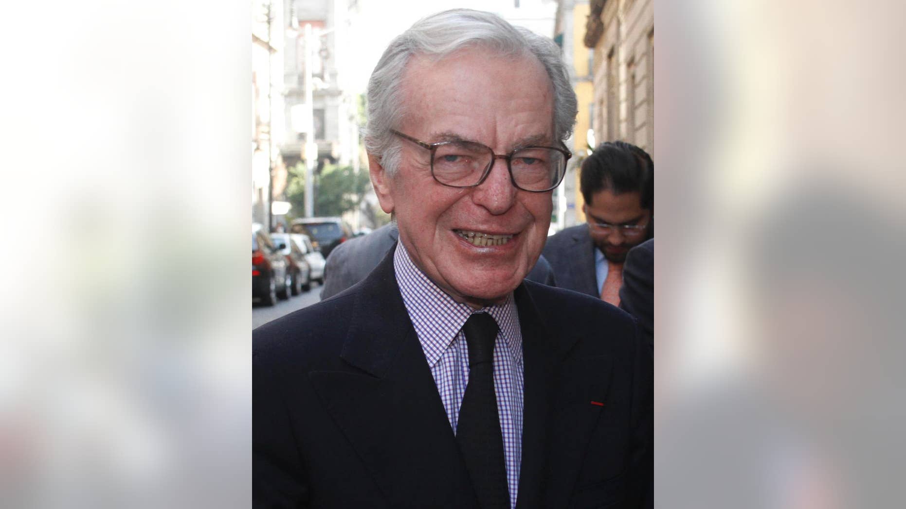 In this March 25, 2014 photo, Mexican journalist and TV anchorman Jacobo Zabludovsky, smiles as he arrives at the Journalists Club of Mexico in Mexico City. Zabludovsky, a journalist who for decades was seen as a symbol of the tight links between Mexico's government and press, died Thursday, July 2, 2015, at the age of 87. Zabludovsky anchored Mexico's most-viewed evening news program for almost three decades, until 1998, covering the nation's tragedies but also reflecting a solidly pro-government political line while working for a the dominant Televisa network. (AP Photo/Jose Melton)
