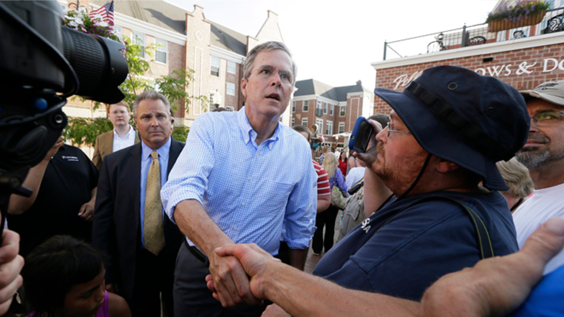 Republican presidential candidate Jeb Bush greets supporters following a town hall meeting, Wednesday, June 17, 2015, in Pella, Iowa. (AP Photo/Charlie Neibergall)