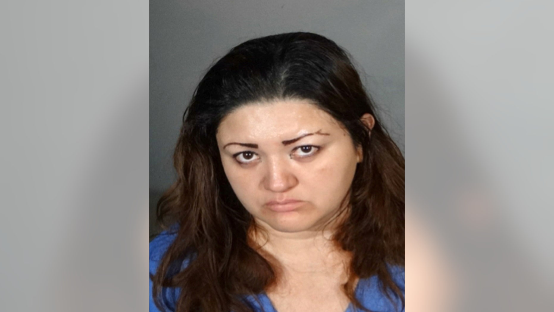 This undated law enforcement booking photo provided by the Los Angeles Police Department shows Veronica Aguilar, 39. Aguilar has been charged with murder in the death of her severely malnourished 11-year-old son Yonatan, whose body was found wrapped in a blanket in a closet in their Los Angeles home Monday, Aug. 22, 2016. Aguilar was charged Thursday, Aug. 25, with one count each of murder and child abuse in the death of her son. (Los Angeles Police Department via AP)