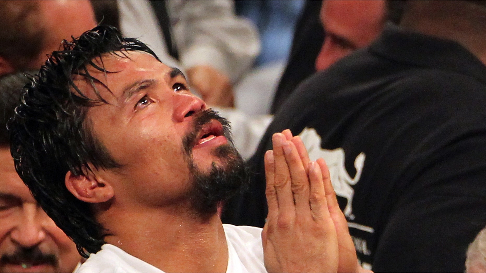 LAS VEGAS, NV - JUNE 09: Manny Pacquiao reacts after his fight against Timothy Bradley at MGM Grand Garden Arena on June 9, 2012 in Las Vegas, Nevada. (Photo by Jeff Bottari/Getty Images)