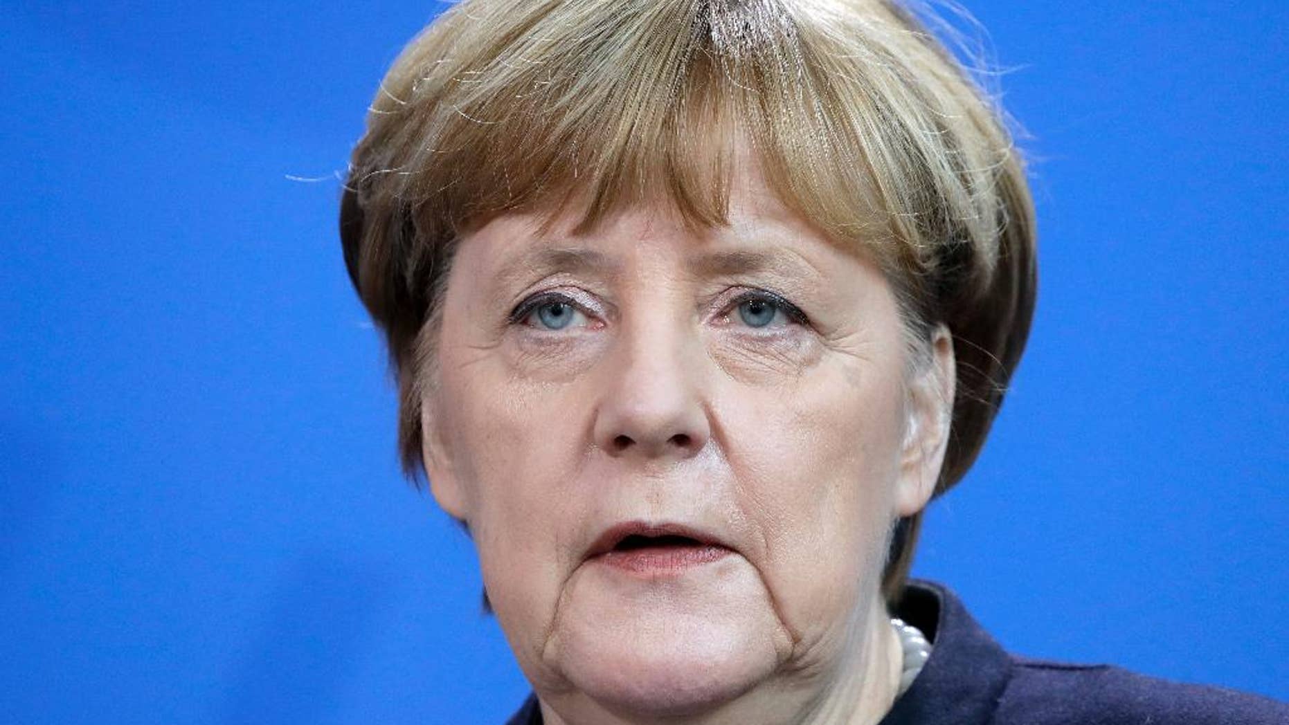 German Chancellor Angela Merkel speaks during a joint news conference as part of a meeting with the Prime Minister of New Zealand Bill English, at the chancellery in Berlin, Germany, Monday, Jan. 16, 2017. (AP Photo/Michael Sohn)