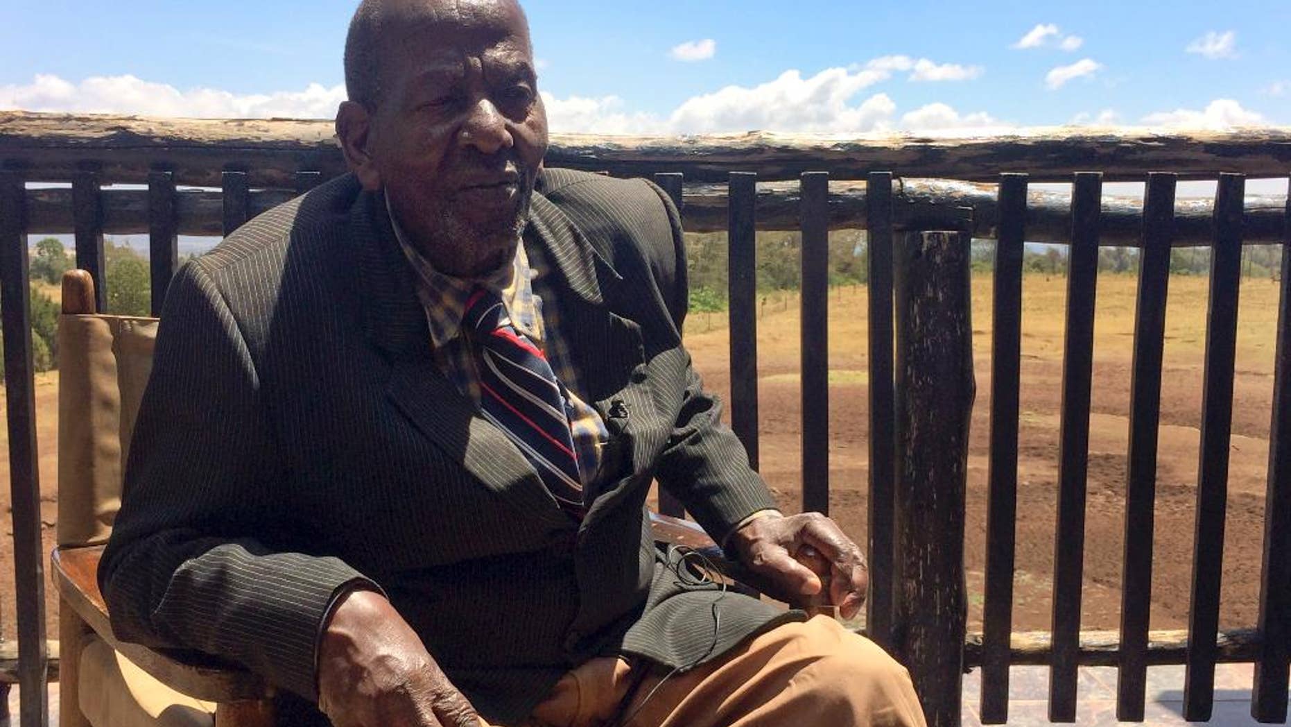 In this photo taken Sunday, Feb. 5, 2017, Nahashon Mureithi, 89, recollects his time as a porter and guide for Britain's Queen Elizabeth II, then Princess Elizabeth, at the Treetops hotel near Nyeri, in Kenya. Sixty-five years ago, Princess Elizabeth went up into the treehouse safari lodge watching elephants below, and was informed that her father had died and she descended from the treehouse a queen. (AP Photo/Andrew Njuguna)