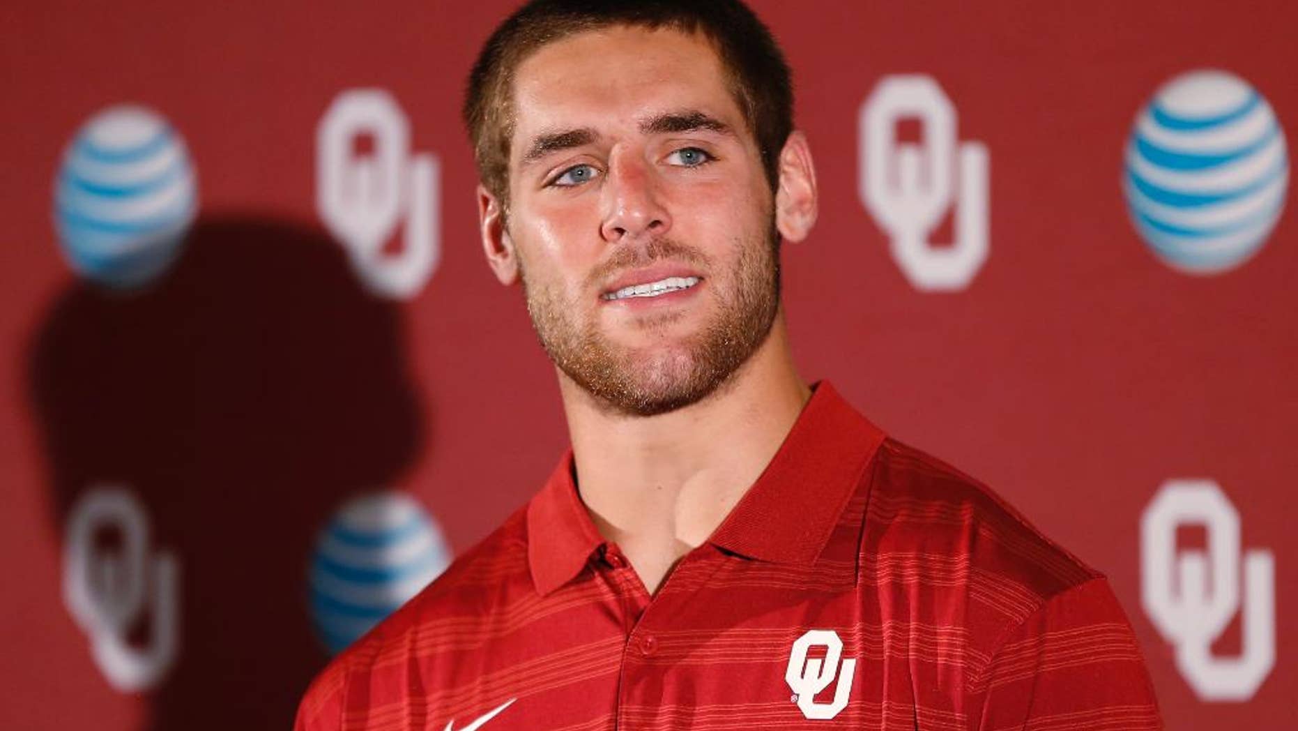 Oklahoma quarterback Trevor Knight answers a question during a news conference in Norman, Okla., Monday, Aug. 25, 2014. Some uncertainties have cleared up as No. 4 Oklahoma prepares to open the season Saturday against Louisiana Tech. (AP Photo/Sue Ogrocki)