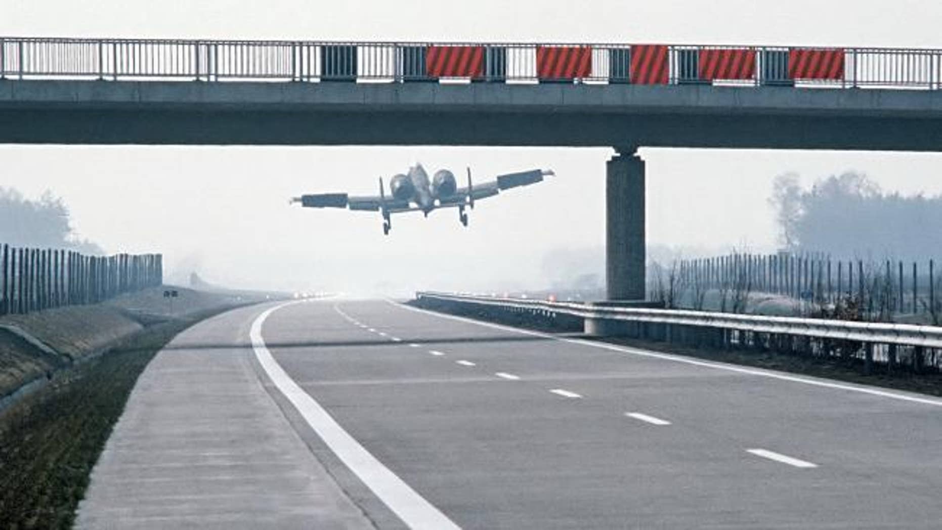 An A-10 Thunderbolt II lands on the German autobahn in the 1980s