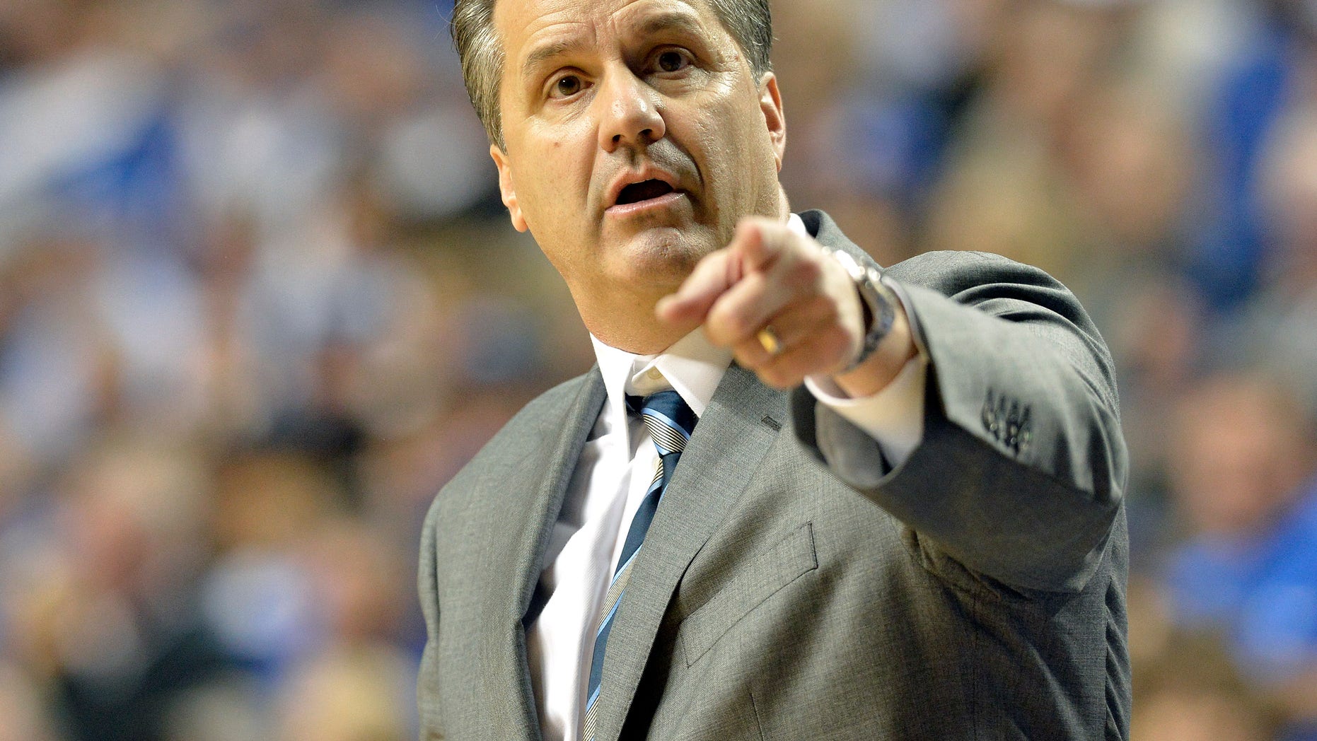 Kentucky head coach John Calipari directs his team during the second half of an NCAA college basketball game Tuesday Dec. 10, 2013, in Lexington, Ky. Kentucky defeated Boise State 70-55. (AP Photo/Timothy D. Easley)