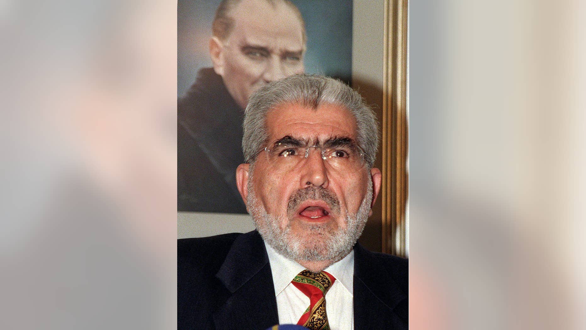 FILE - In this Nov. 28, 1998 file photo, Korkut Ozal, a former Turkish government minister and brother of Turkey's late president Turgut Ozal, speaks in Ankara, Turkey. Turkey's state-run news agency says Ozal has died at 87. The Anadolu Agency says Ozal died early Wednesday, Nov. 2, 2016, at his home in Istanbul of respiratory and circulatory failure.(AP Photo/File)