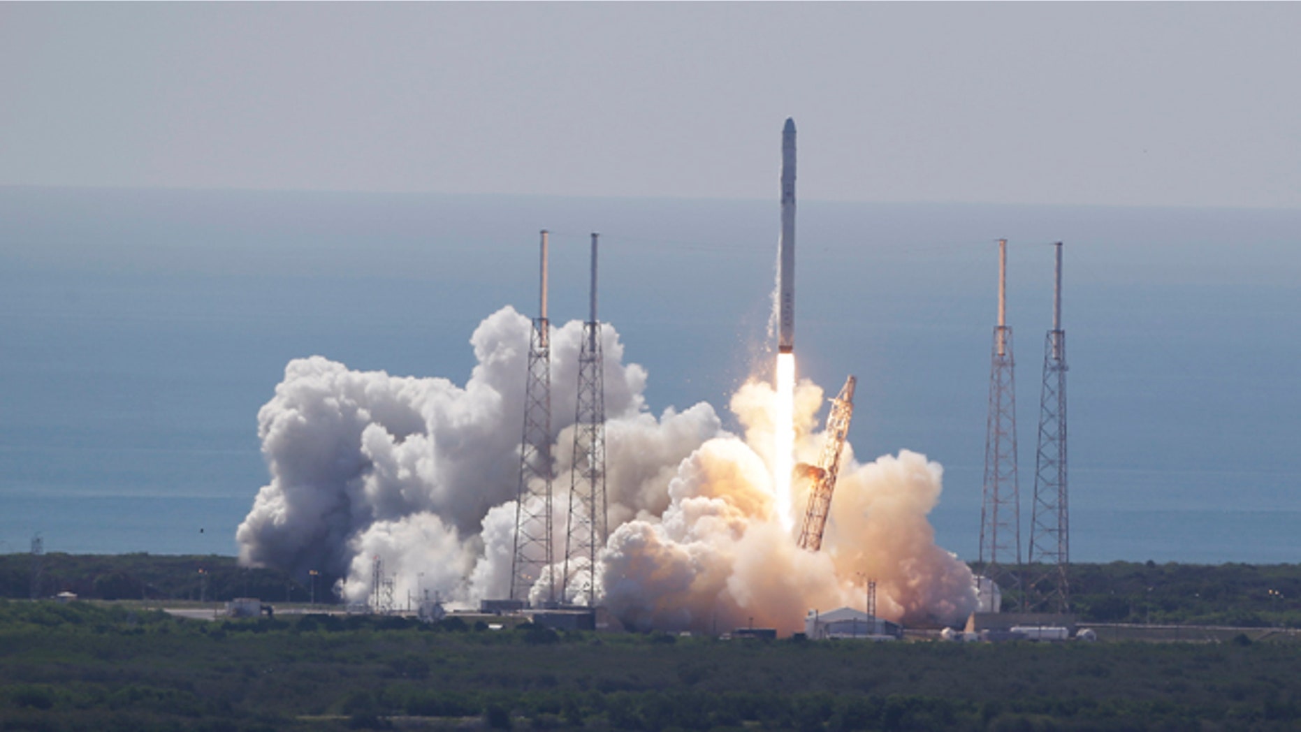 The SpaceX Falcon 9 rocket and Dragon spacecraft lifts off from Space Launch Complex 40 at the Cape Canaveral Air Force Station in Cape Canaveral, Fla., Sunday, June 28, 2015. The rocket carrying supplies to the International Space Station broke apart shortly after liftoff. (AP Photo/John Raoux)