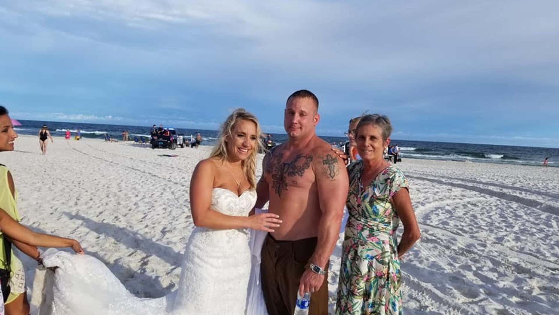 Moments after he got married, Coast Guard Petty Officer 2nd Class Zac Edwards saved a man from drowning on an Alabama beach.