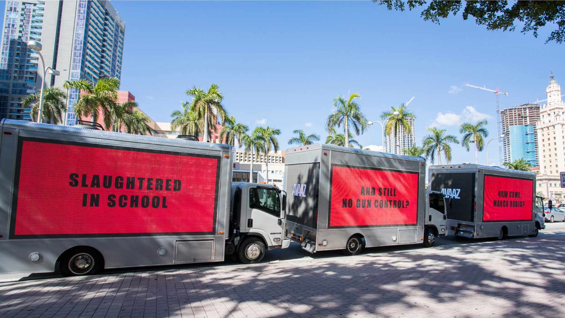 Civic group Avaaz had three movie-inspired mobile billboards in Miami calling for gun reform.
